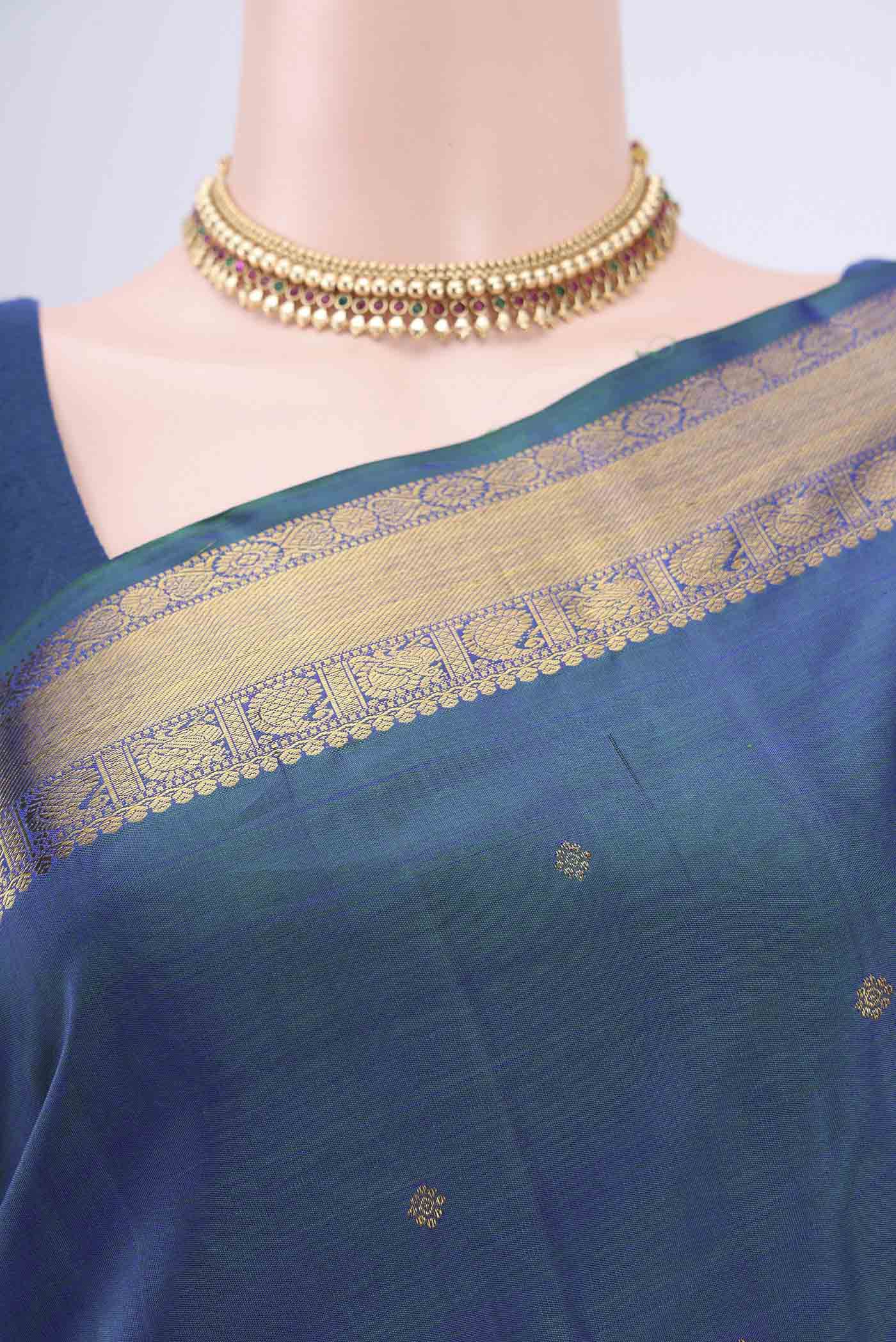 Border image of Pure Silk Pure Zari Peacock Blue Dual Tone Kanchipuram Saree with Zari Butta on the body and Zari Border. 