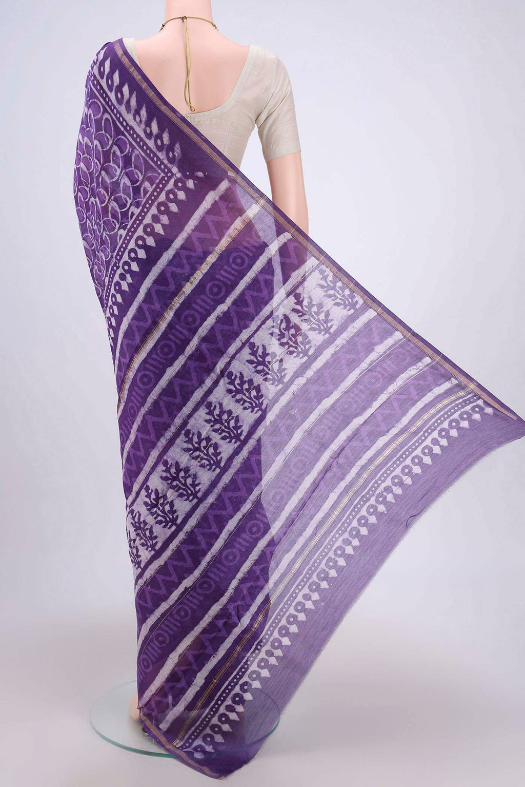 Flat view of Purple Chanderi Silk Cotton Saree with Printed design on the body and Zari Border. 