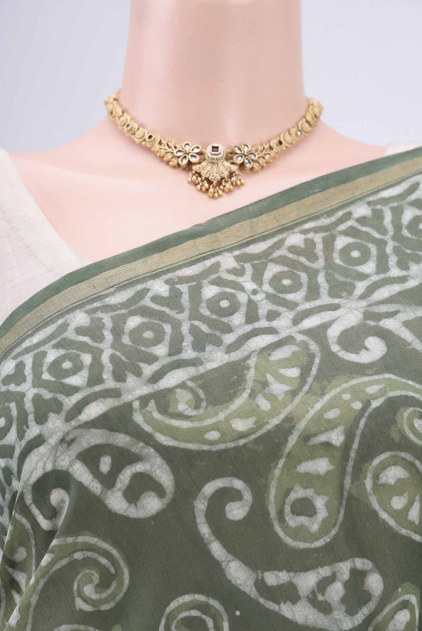 Border image of Sage Green Chanderi Silk Cotton Saree with Printed design on the body and Zari Border. 