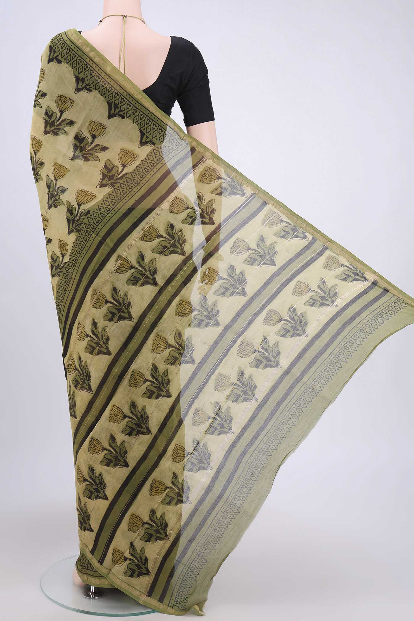 Flat view of Light Green Chanderi Silk Saree with Printed design on the body and Zari Border. 