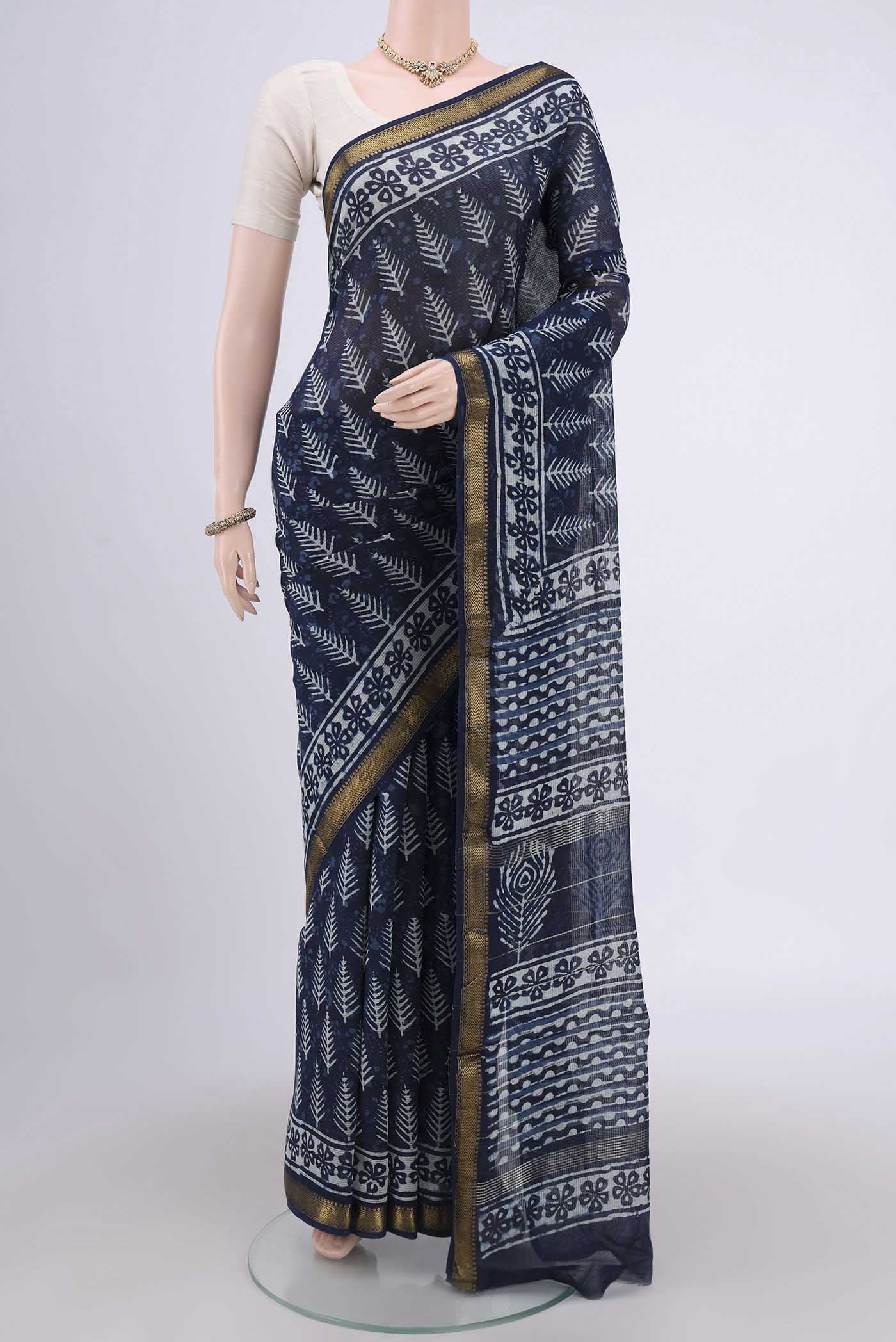 Indigo Maheshwari Silk Cotton Saree with Printed design on the body and Zari Border.  displayed on a mannequin