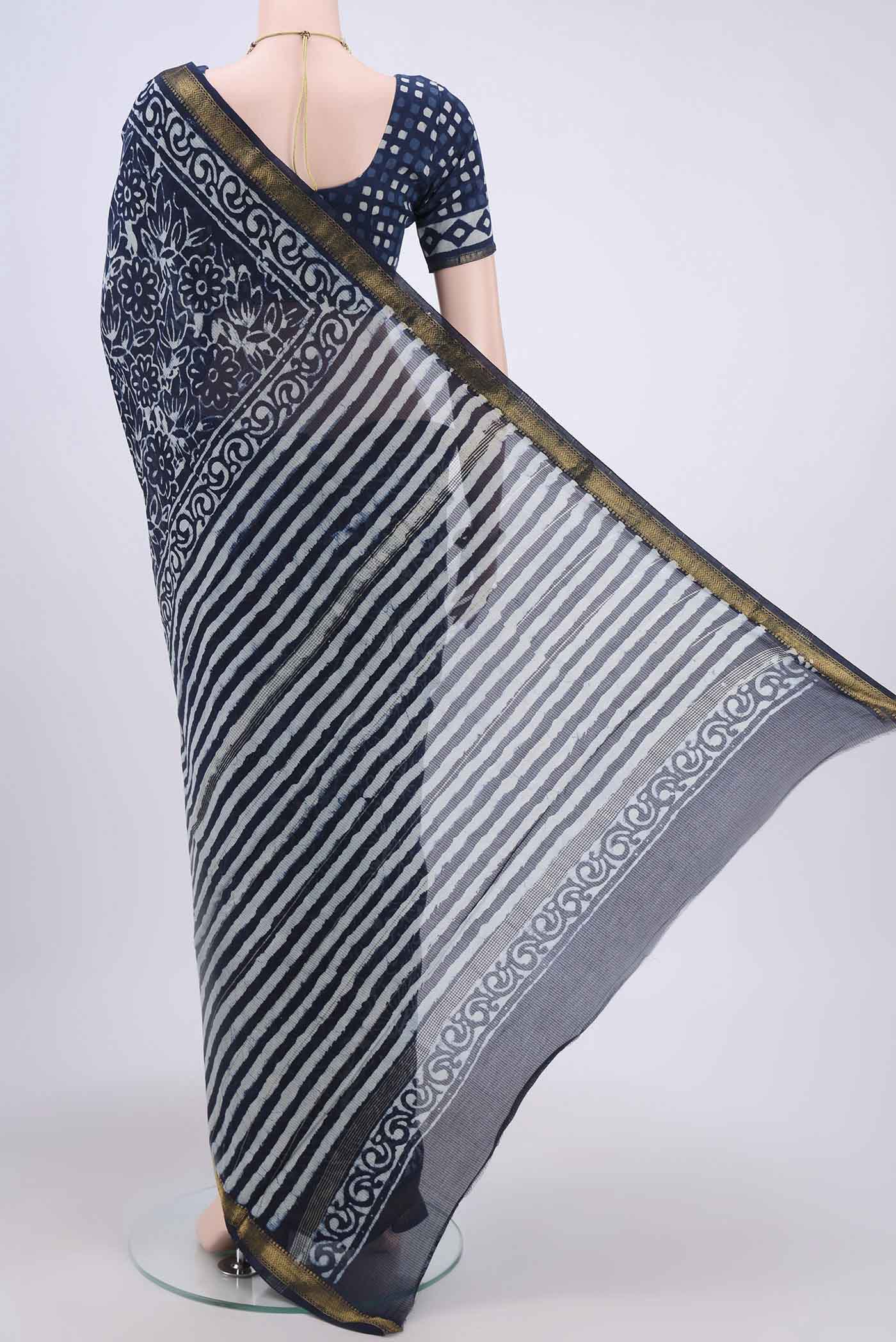 Flat view of Indigo Maheshwari Silk Cotton Saree with Printed design on the body and Zari Border. 