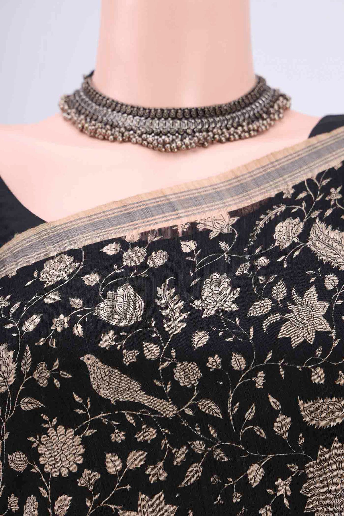 Border image of Black Tussar Silk Saree with Printed design on the body and Plain Border. 
