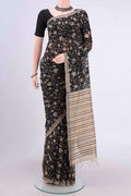 Black Tussar Silk Saree with Printed design on the body and Plain Border.  displayed on a mannequin