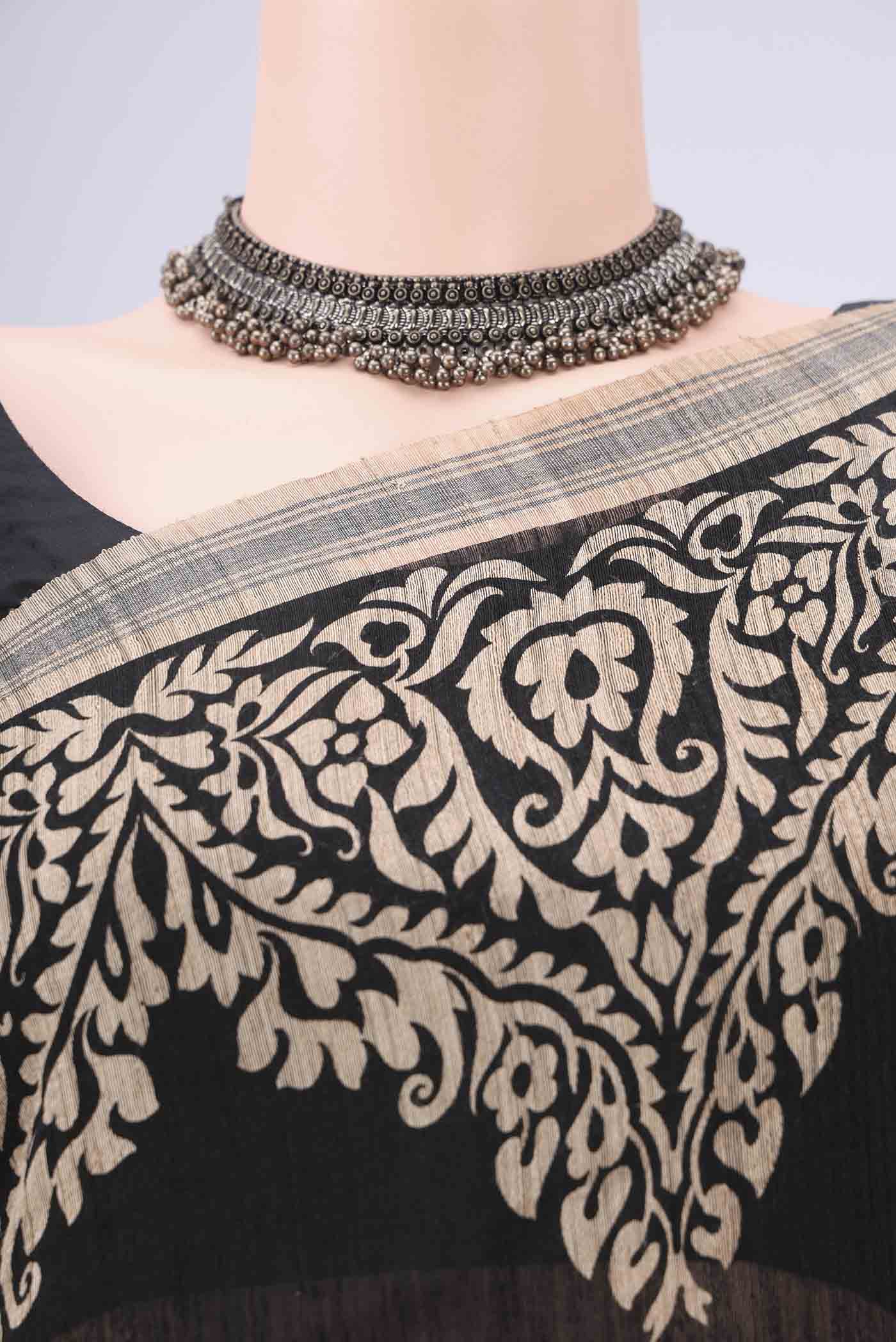Border image of Black Tussar Silk Saree with Plain Body and Plain Border. 
