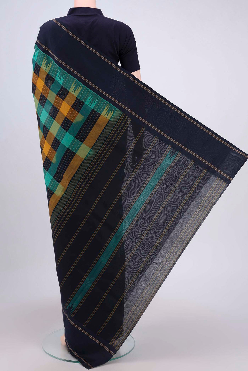 Flat view of Multi Color Kanchi Cotton Saree with Checked design on the body and Thread Border. 