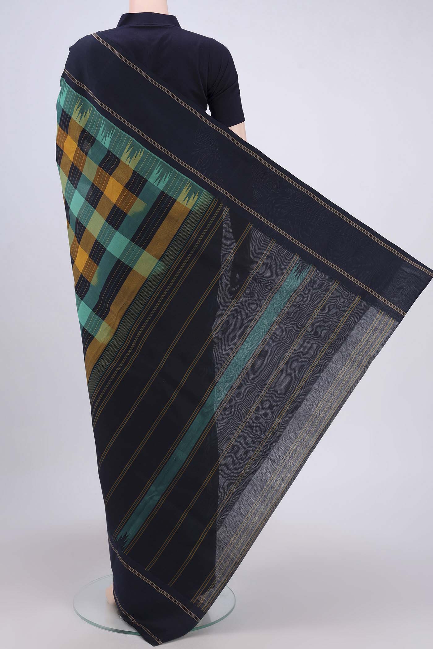 Flat view of Multi Color Kanchi Cotton Saree with Checked design on the body and Thread Border. 