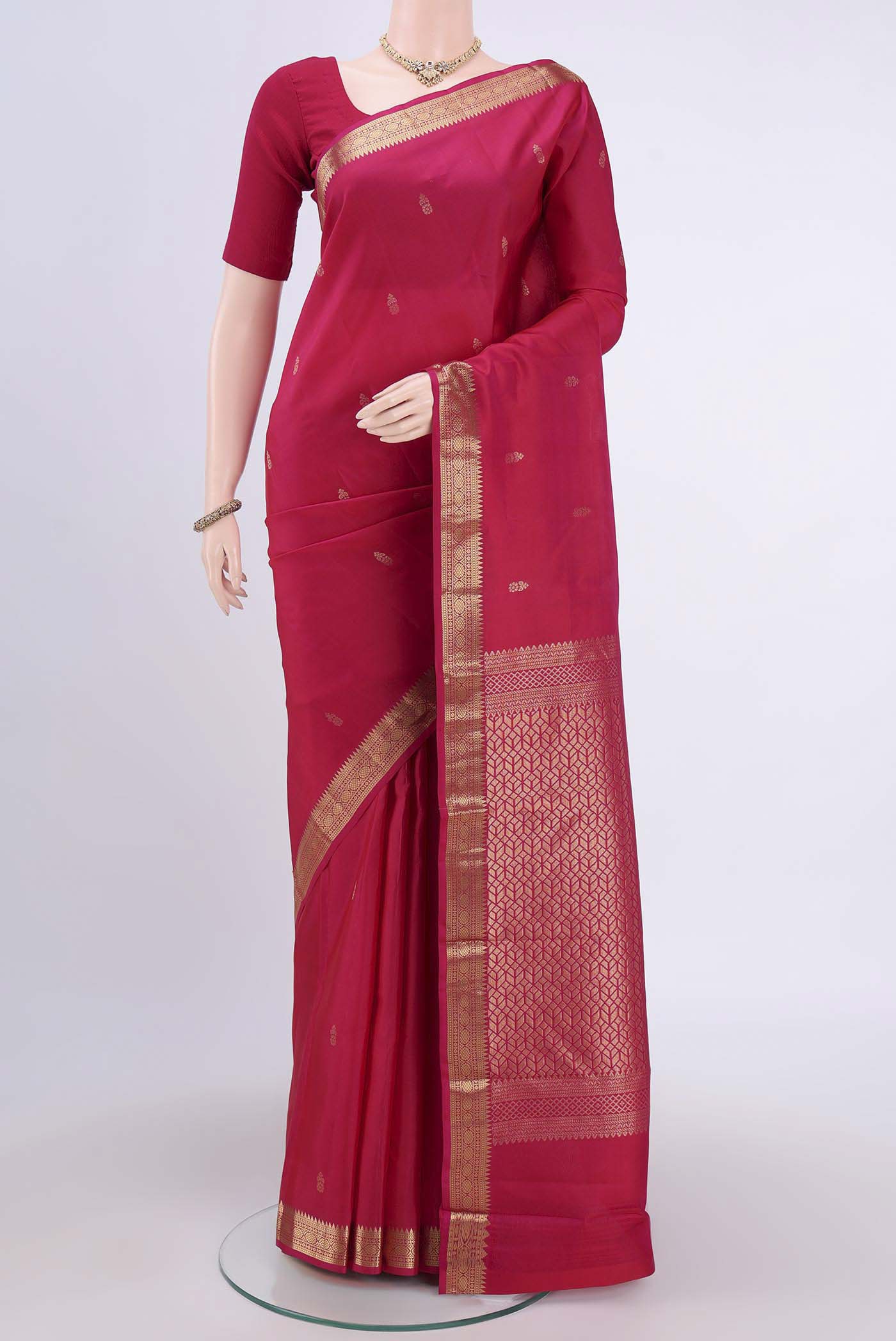 Dark Pink Nangavalli Silk [ Salem ] Saree with Zari Butta on the body and Zari Border.  displayed on a mannequin