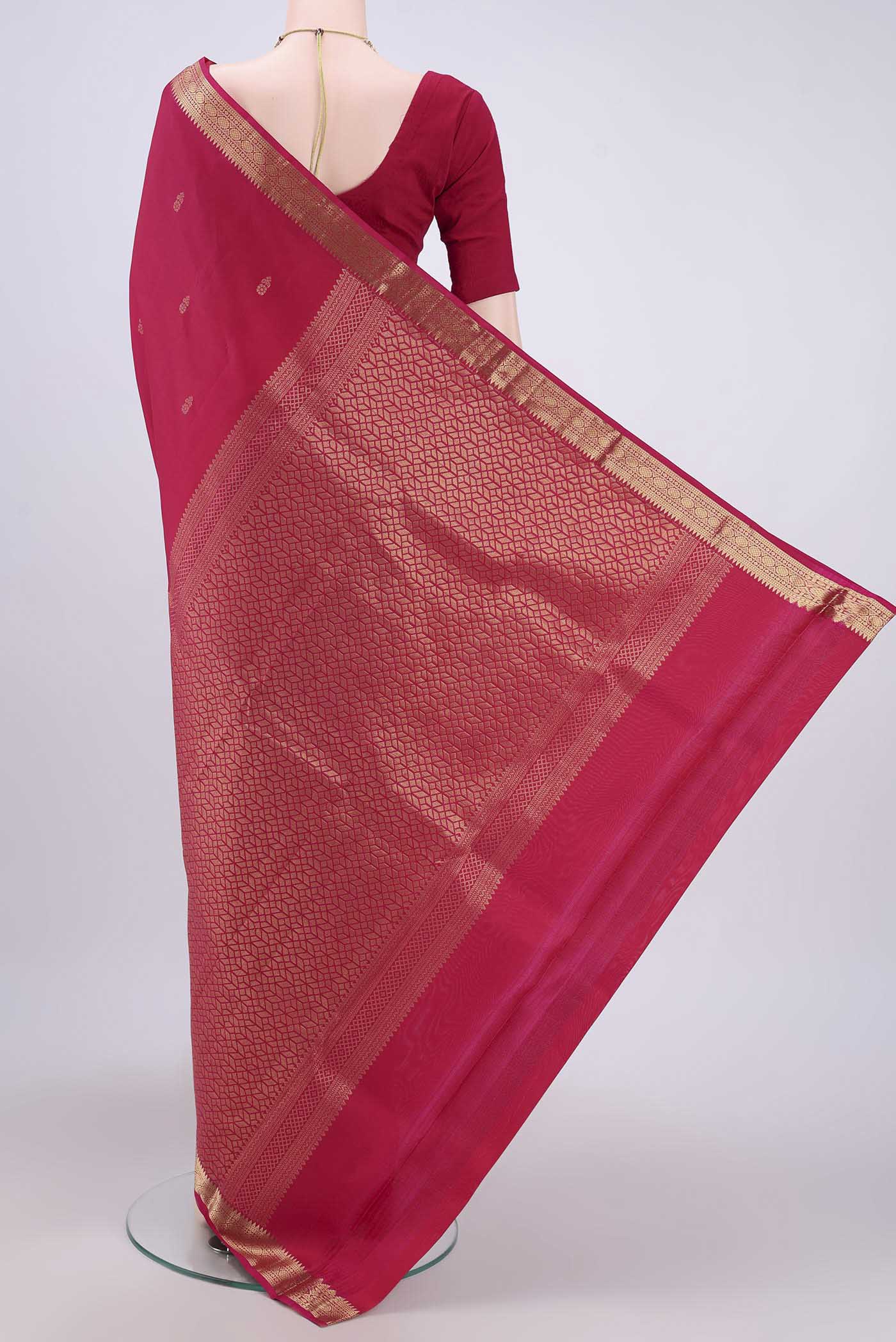 Flat view of Dark Pink Nangavalli Silk [ Salem ] Saree with Zari Butta on the body and Zari Border. 