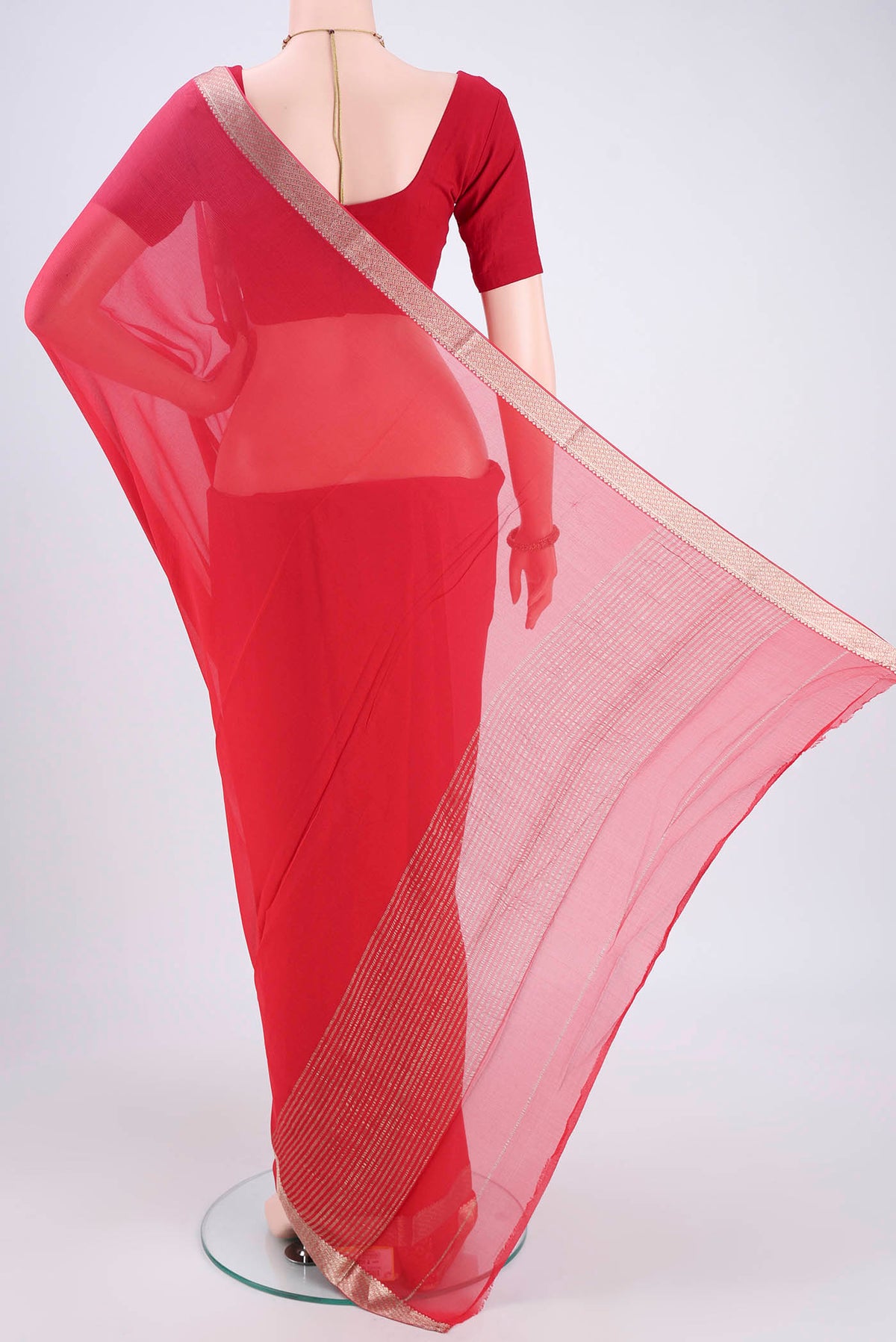 Flat view of Red Mysore Chiffon Saree with Plain Body and Zari Border. 