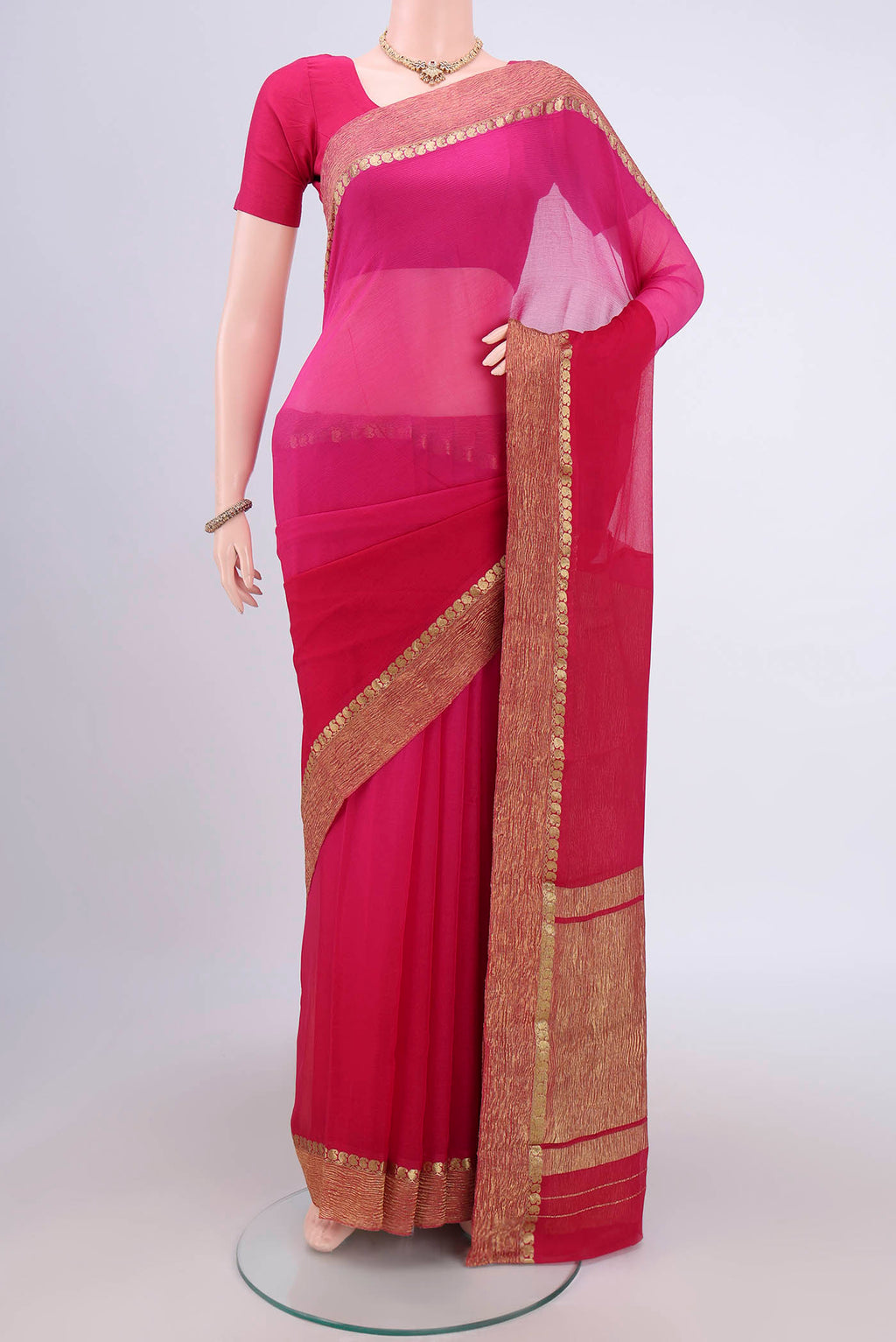 Dark Pink Mysore Chiffon Saree with Half And Half on the body and Zari Border.  displayed on a mannequin
