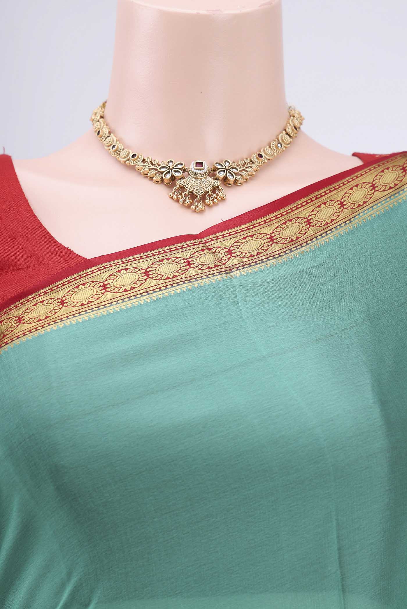 Border image of Sea Green Mysore Crepe Saree with Plain Body and Zari Border. 