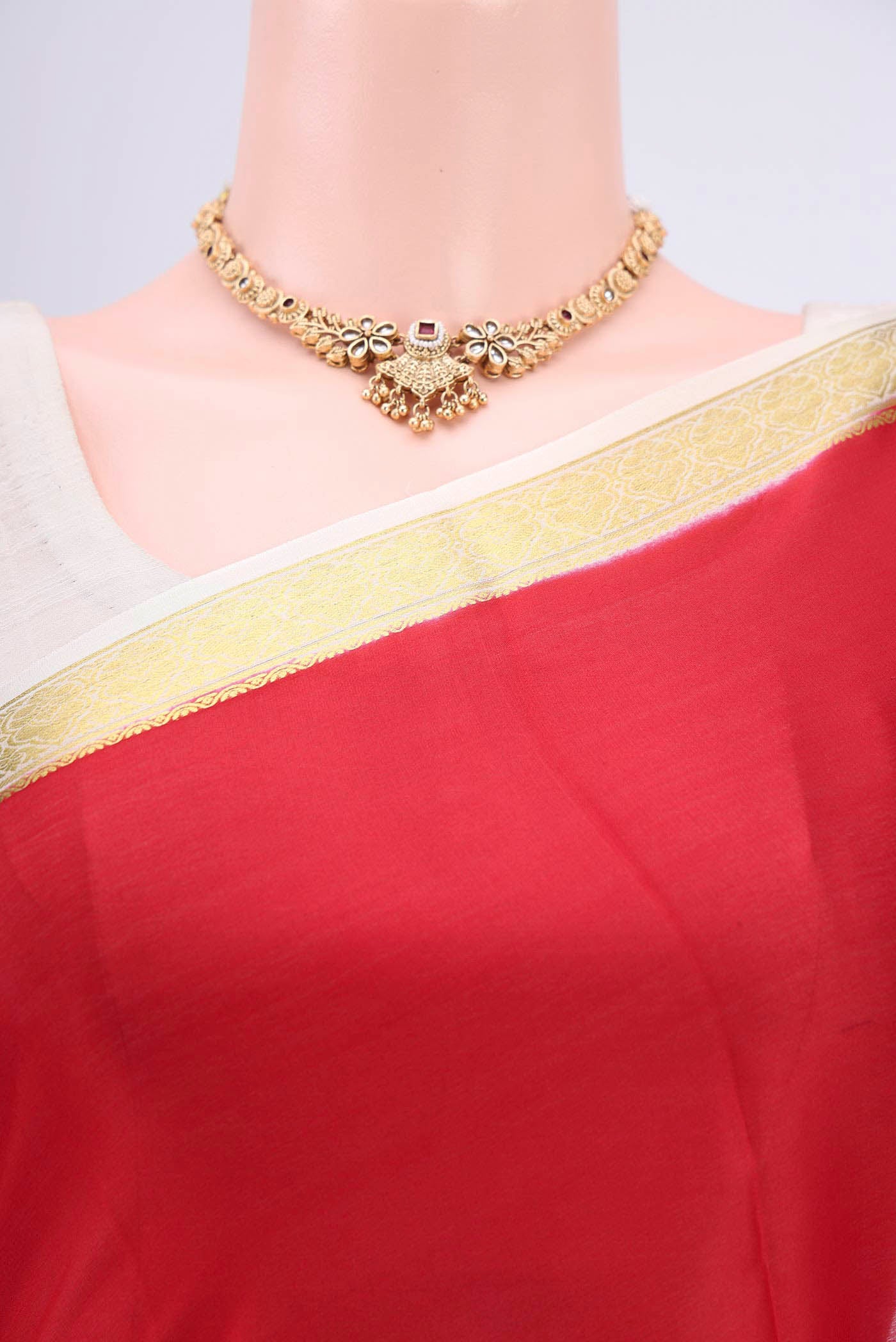 Border image of Red Mysore Crepe Saree with Plain Body and Zari Border. 