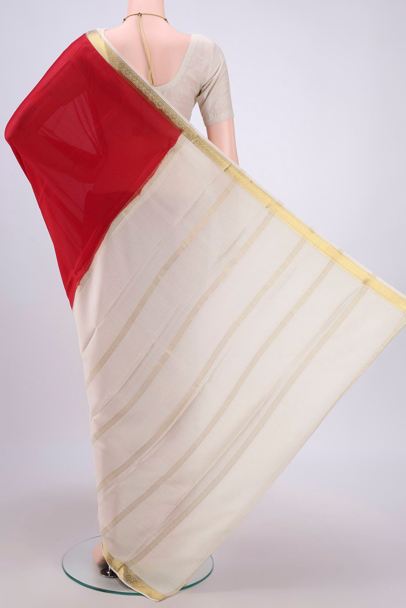 Flat view of Red Mysore Crepe Saree with Plain Body and Zari Border. 