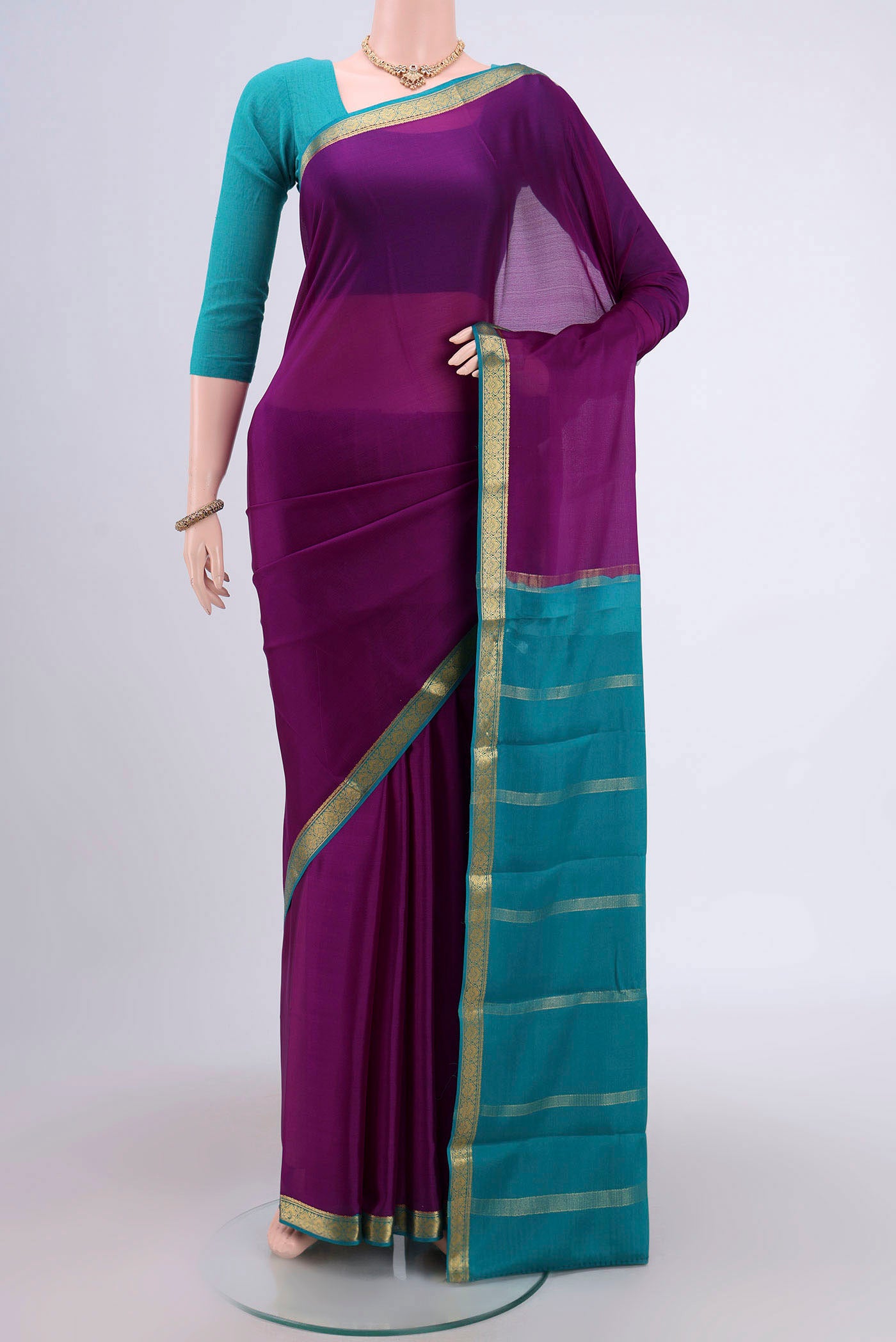 Purple Mysore Crepe Saree with Plain Body and Zari Border.  displayed on a mannequin