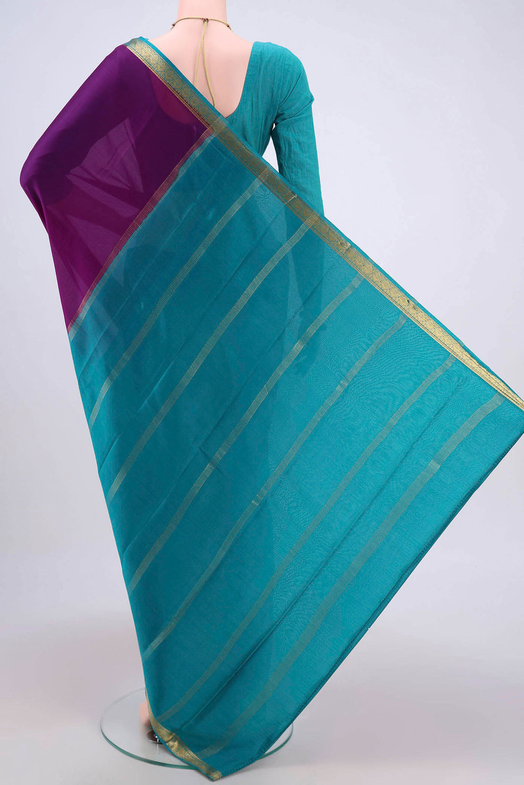 Flat view of Purple Mysore Crepe Saree with Plain Body and Zari Border. 