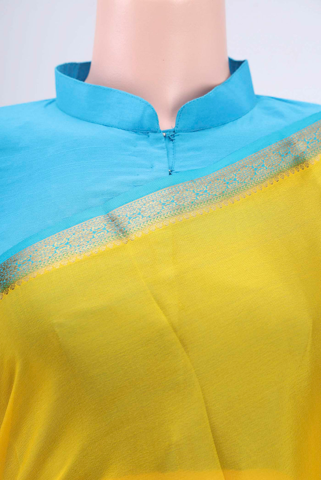 Border image of Lemon Yellow Mysore Crepe Saree with Plain Body and Zari Border. 