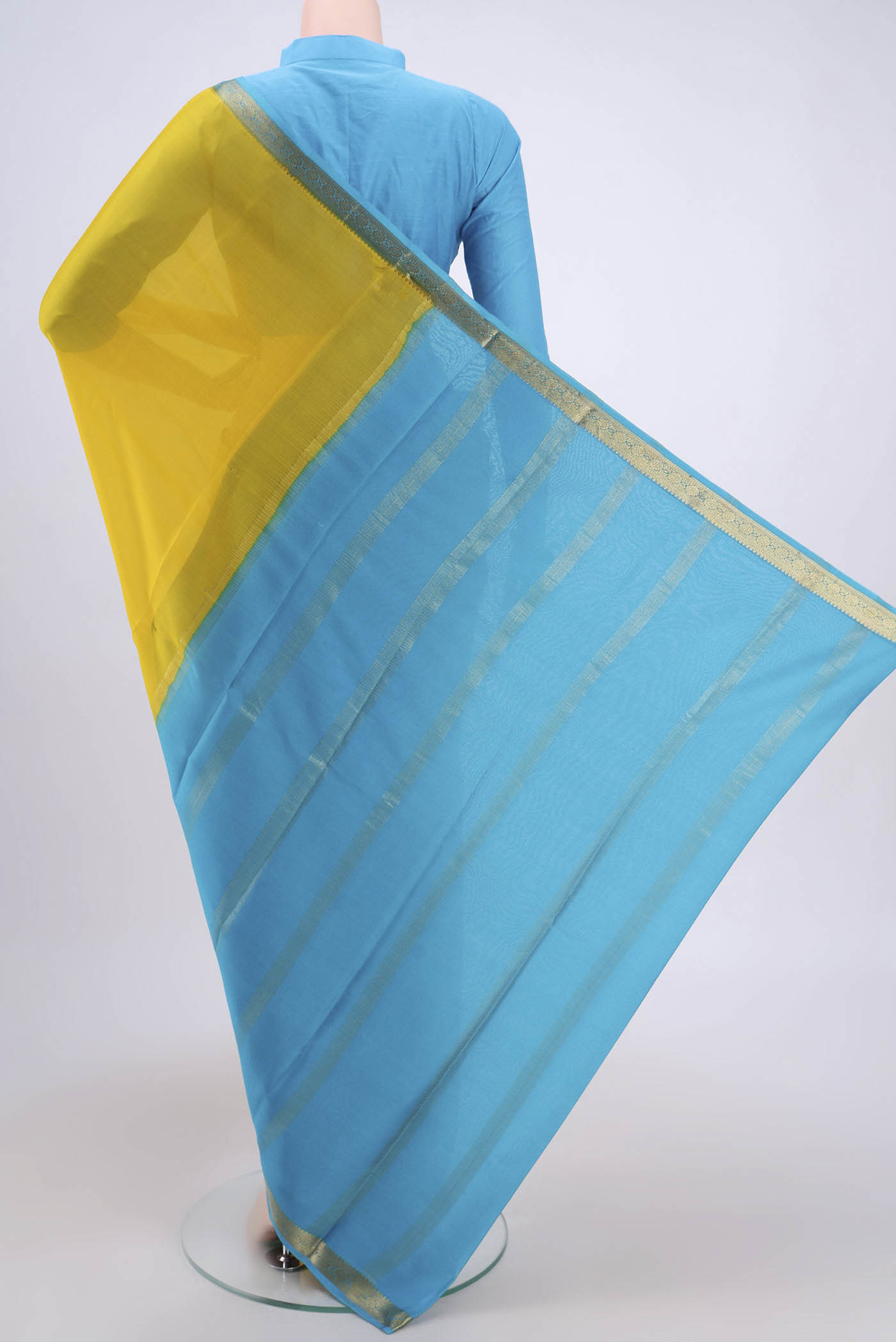 Flat view of Lemon Yellow Mysore Crepe Saree with Plain Body and Zari Border. 