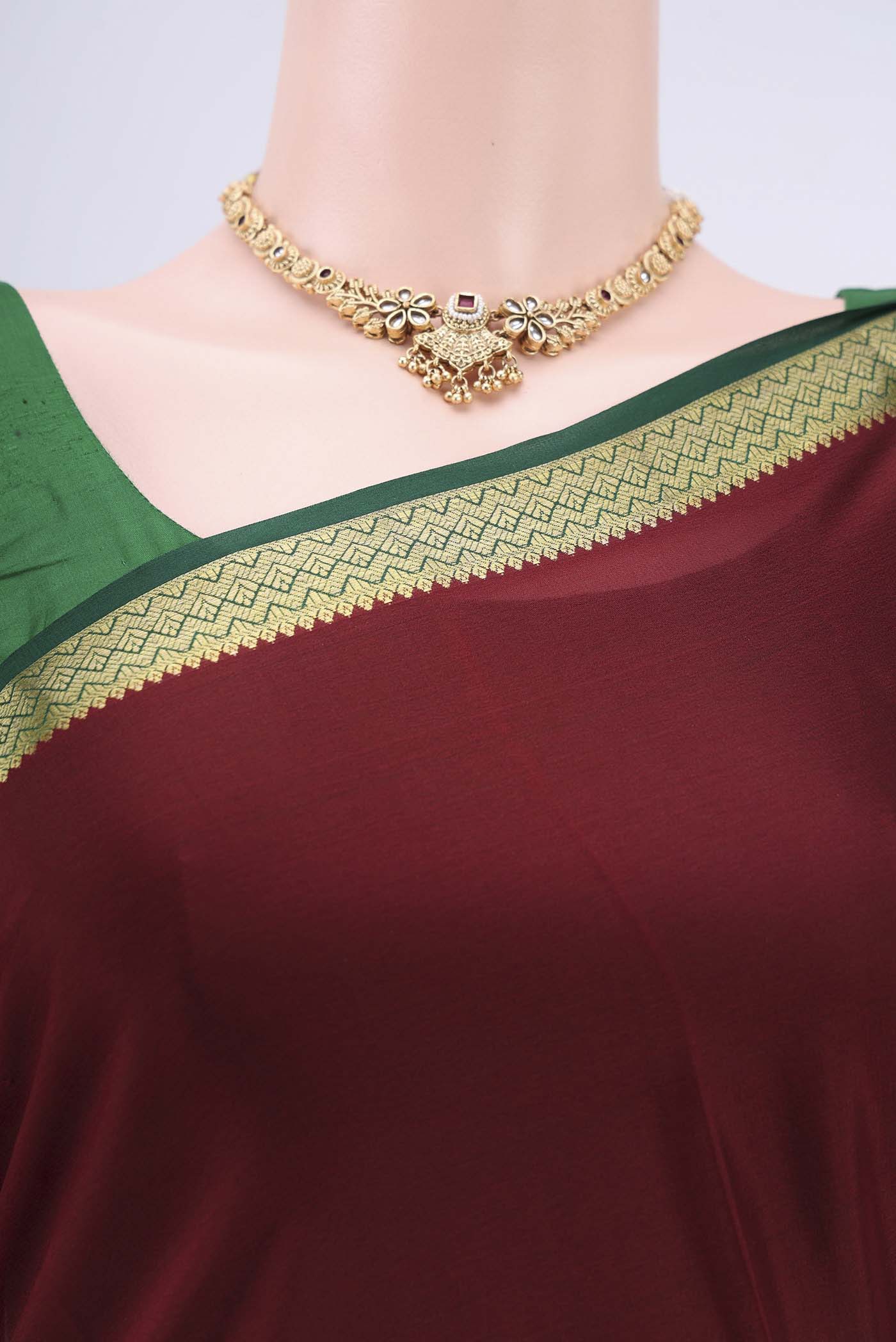 Border image of Maroon Mysore Crepe Saree with Plain Body and Zari Border. 