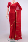 Red Mysore Crepe Saree with Plain Body and Zari Border.  displayed on a mannequin