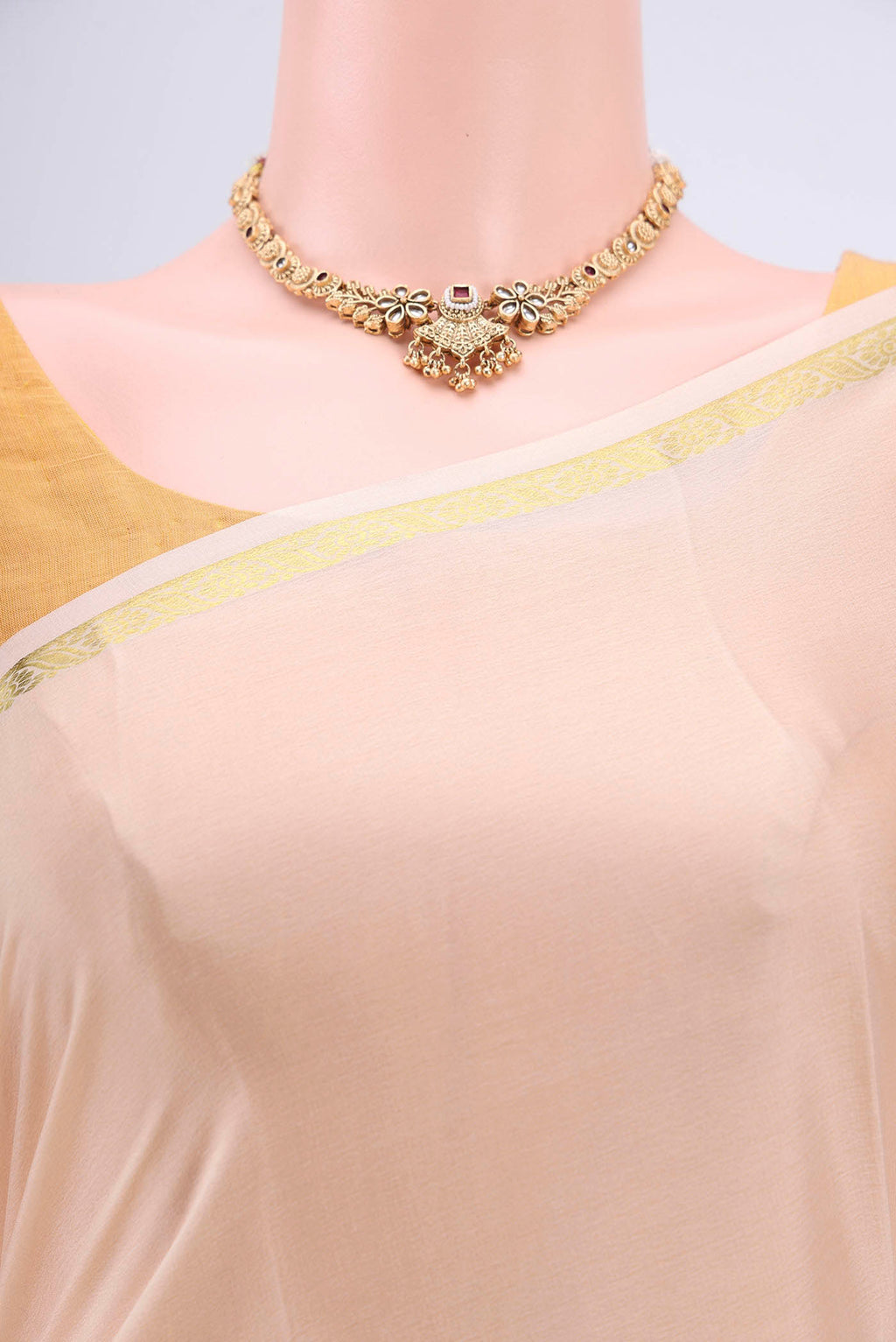 Border image of Cream Mysore Crepe Saree with Plain Body and Zari Border. 