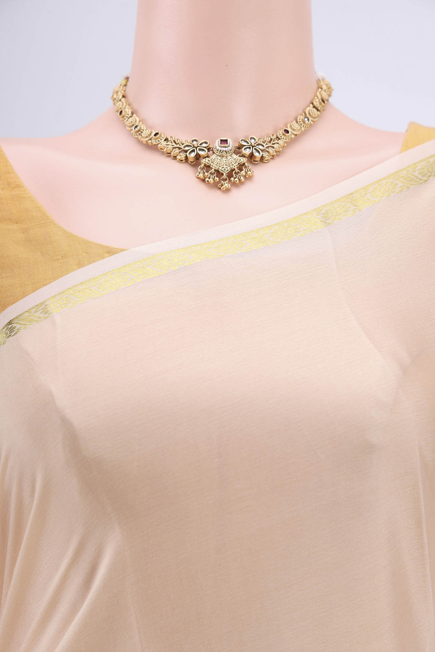 Border image of Cream Mysore Crepe Saree with Plain Body and Zari Border. 