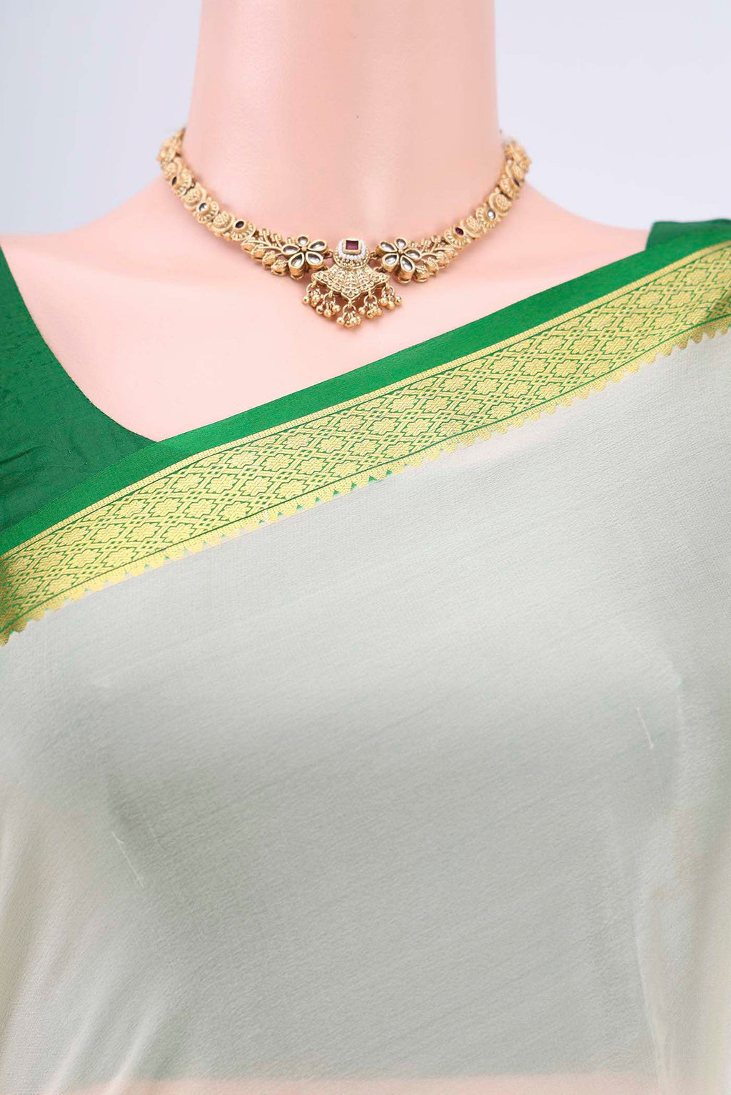 Border image of Off White Mysore Crepe Saree with Plain Body and Zari Border. 