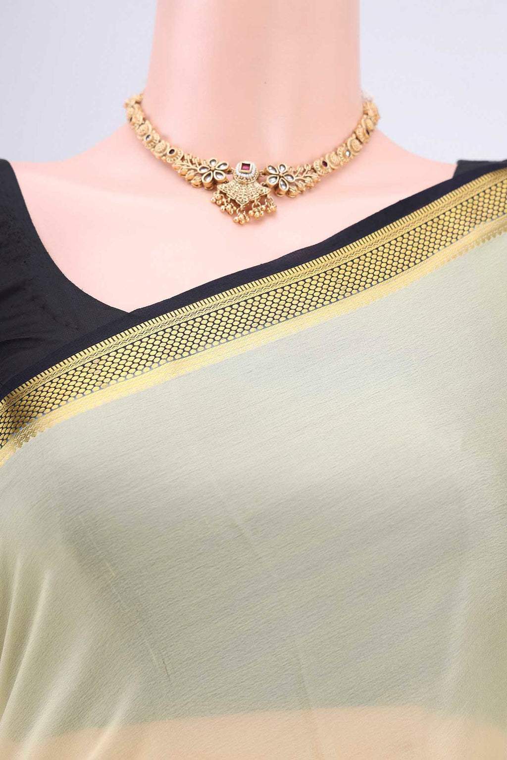 Border image of Cream Mysore Crepe Saree with Plain Body and Zari Border. 