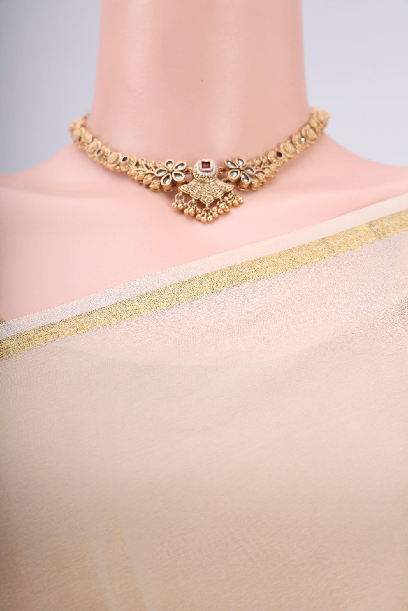Border image of Cream Mysore Crepe Saree with Plain Body and Zari Border. 