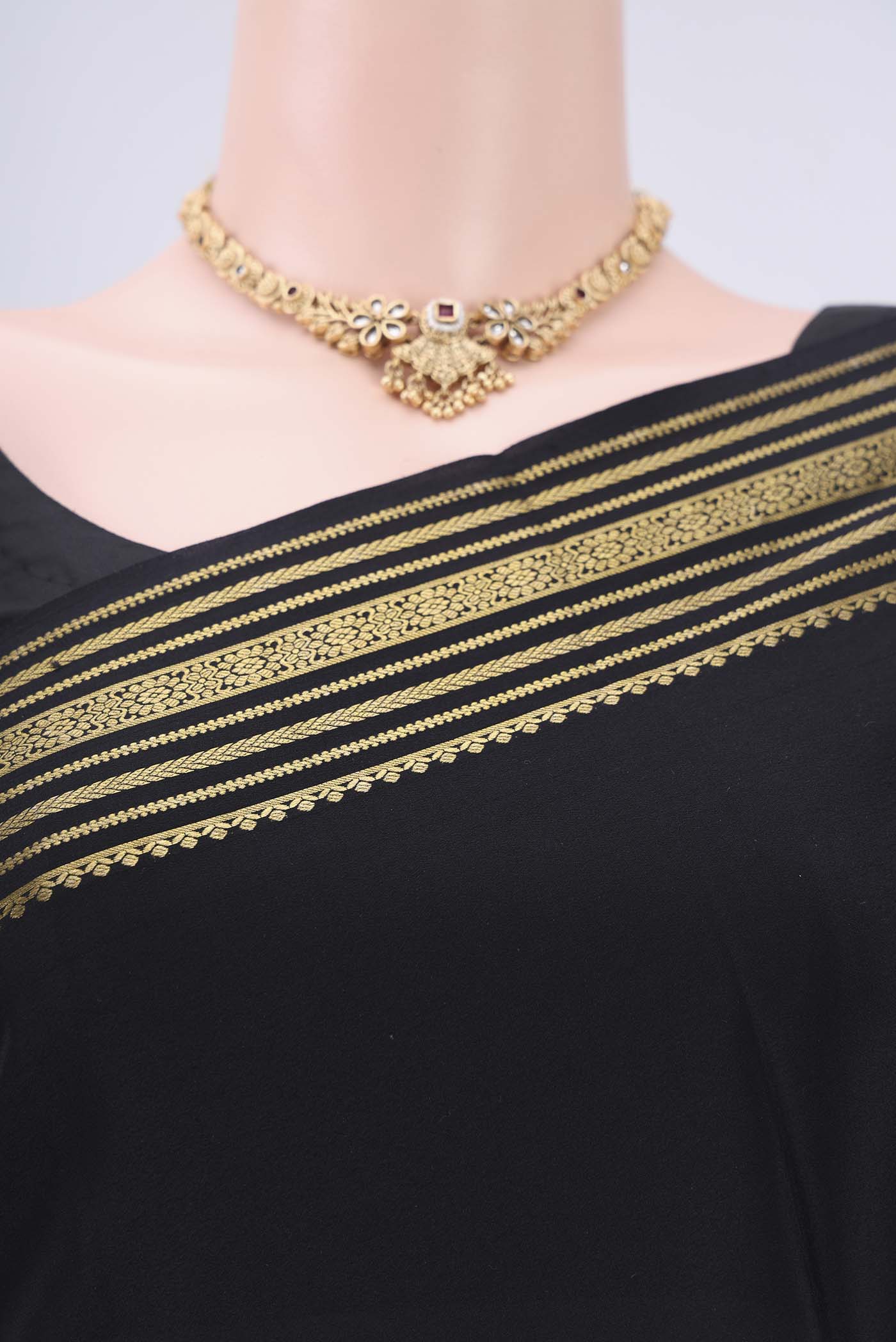 Border image of Black Mysore Crepe Saree with Plain Body and Zari Border. 