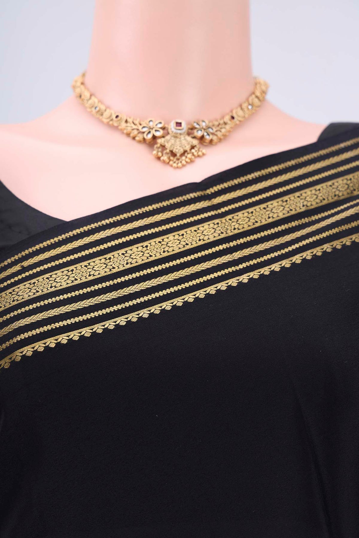 Border image of Black Mysore Crepe Saree with Plain Body and Zari Border. 