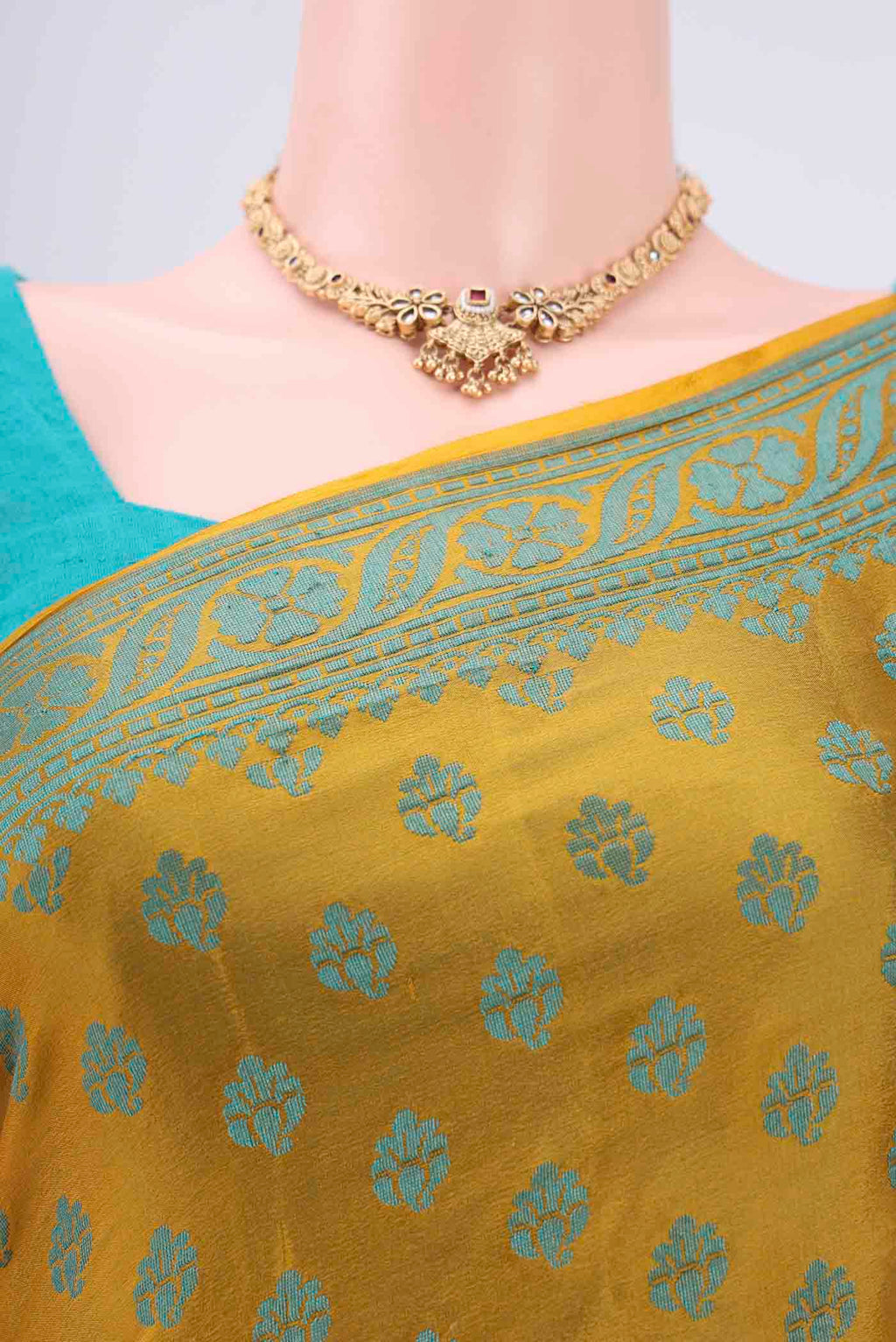 Border image of Yellow Blended Banarasi Georgette Saree with Thread Butta on the body and Thread Border. 
