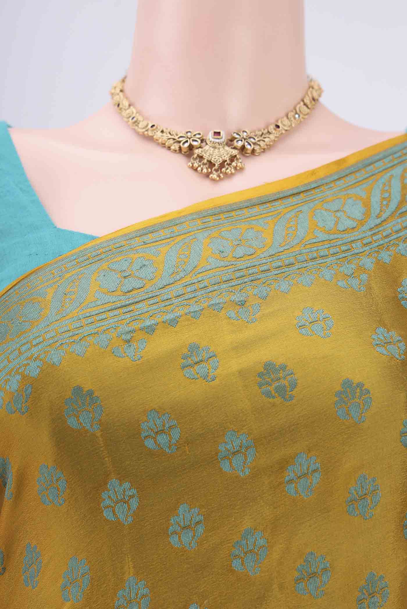 Border image of Yellow Blended Banarasi Georgette Saree with Thread Butta on the body and Thread Border. 