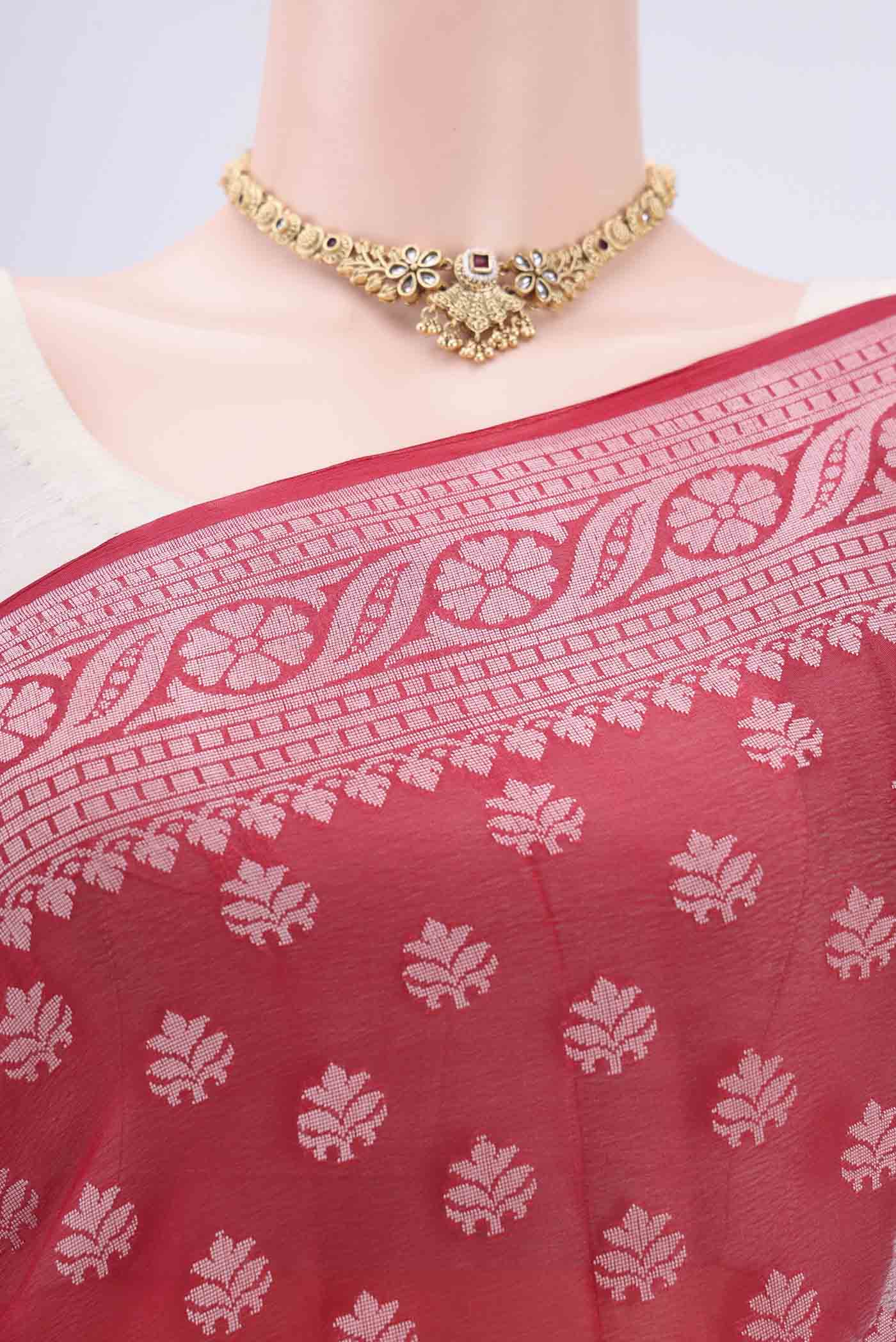 Border image of Red Blended Banarasi Georgette Saree with Thread Butta on the body and Thread Border. 