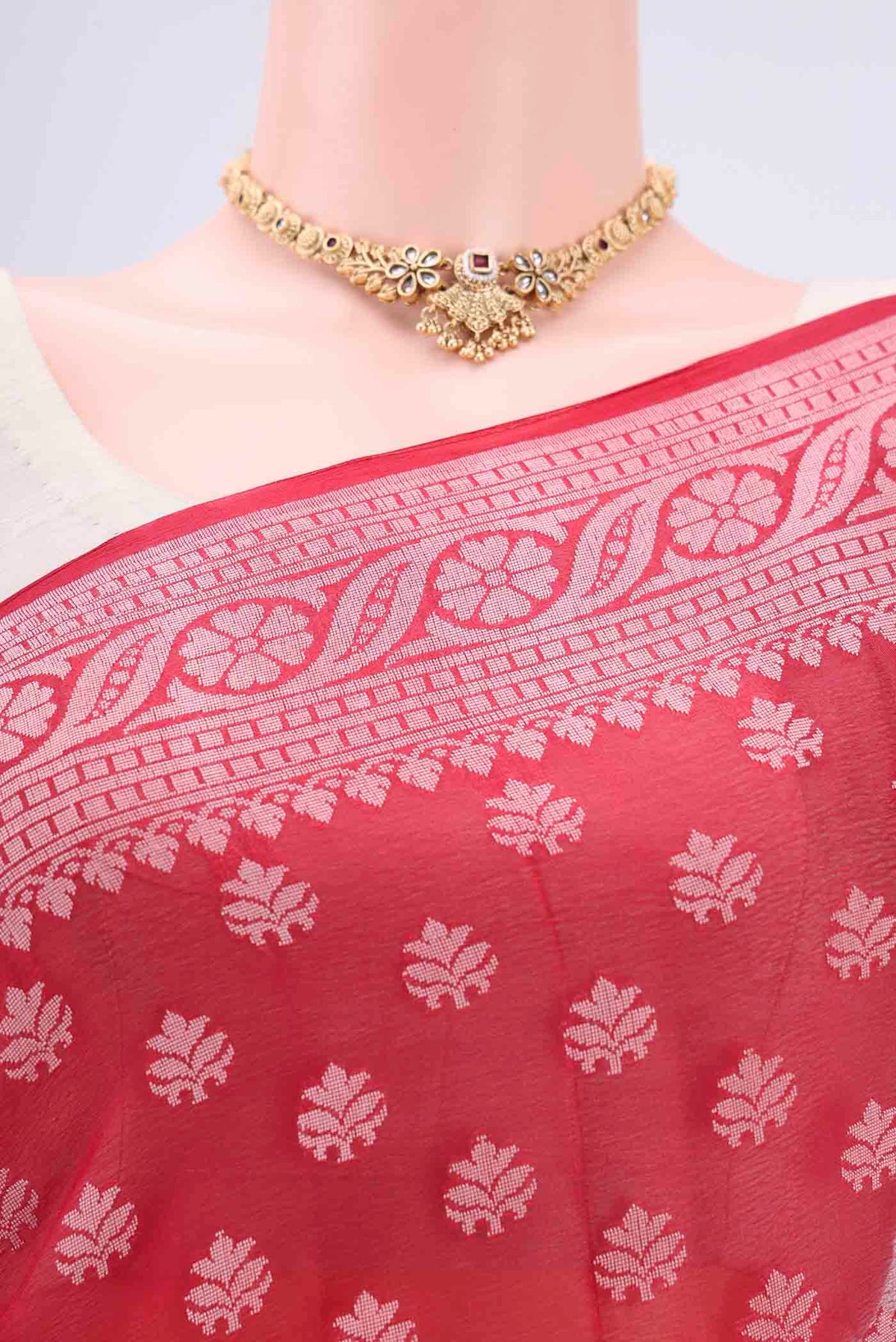 Border image of Red Blended Banarasi Georgette Saree with Thread Butta on the body and Thread Border. 
