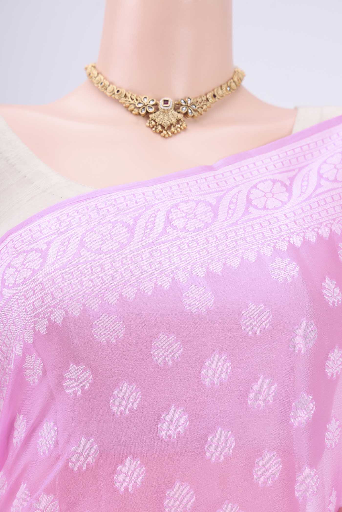 Border image of Rose pink Blended Banarasi Georgette Saree with Thread Butta on the body and Thread Border. 