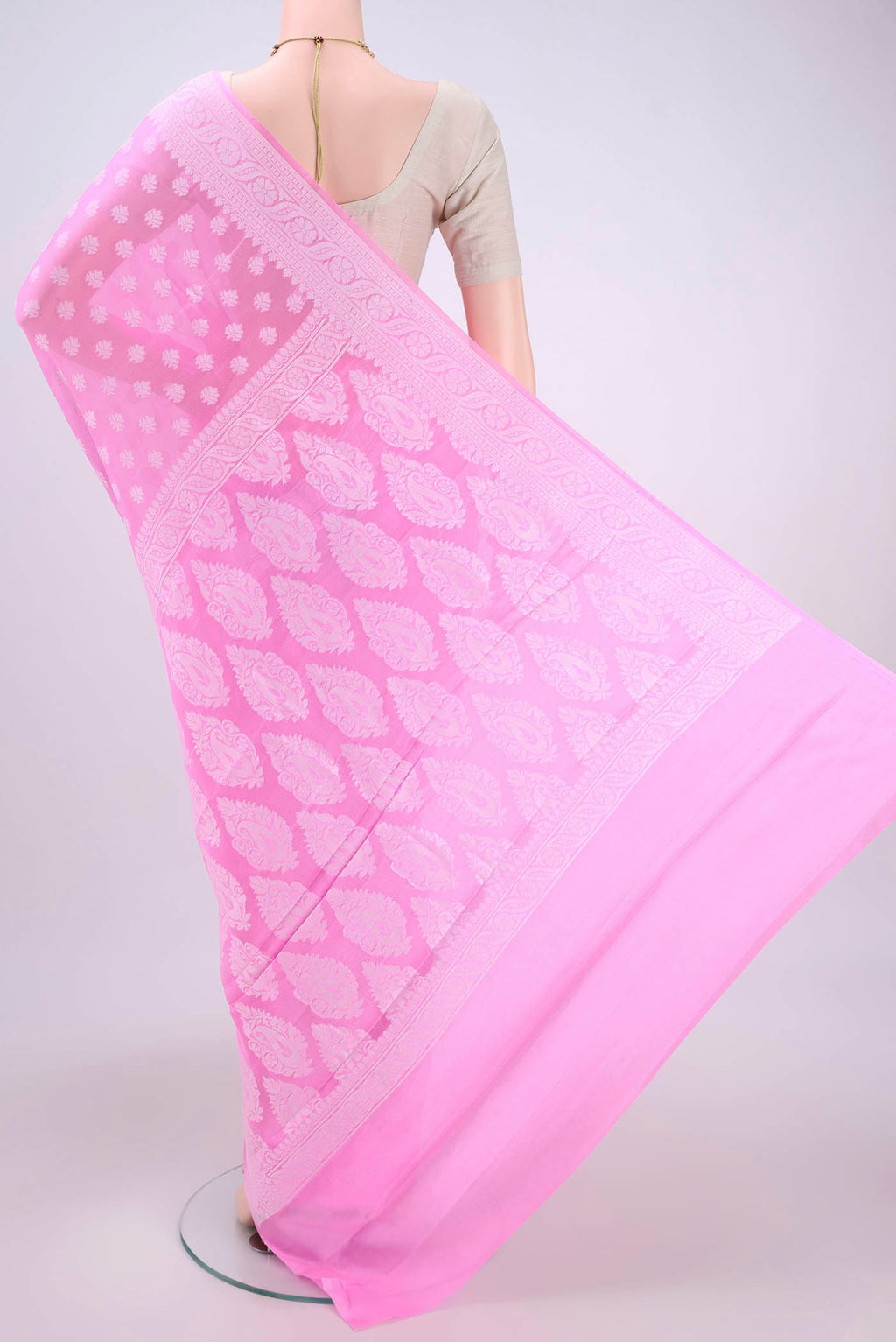 Flat view of Rose pink Blended Banarasi Georgette Saree with Thread Butta on the body and Thread Border. 