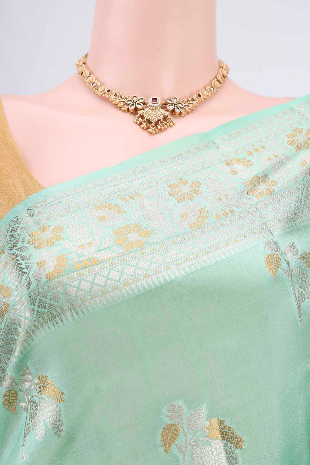 Border image of Mint Green Banarasi Raw Silk Saree with Zari Butta on the body and Zari Border. 