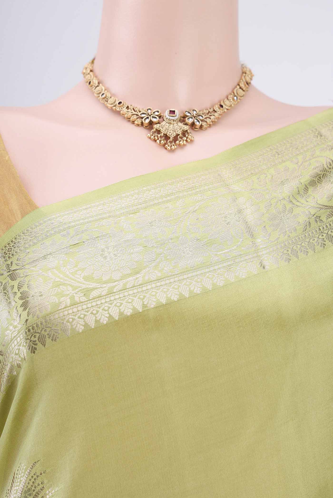 Border image of Acid Green Banarasi Raw Silk Saree with Zari Butta on the body and Zari Border. 