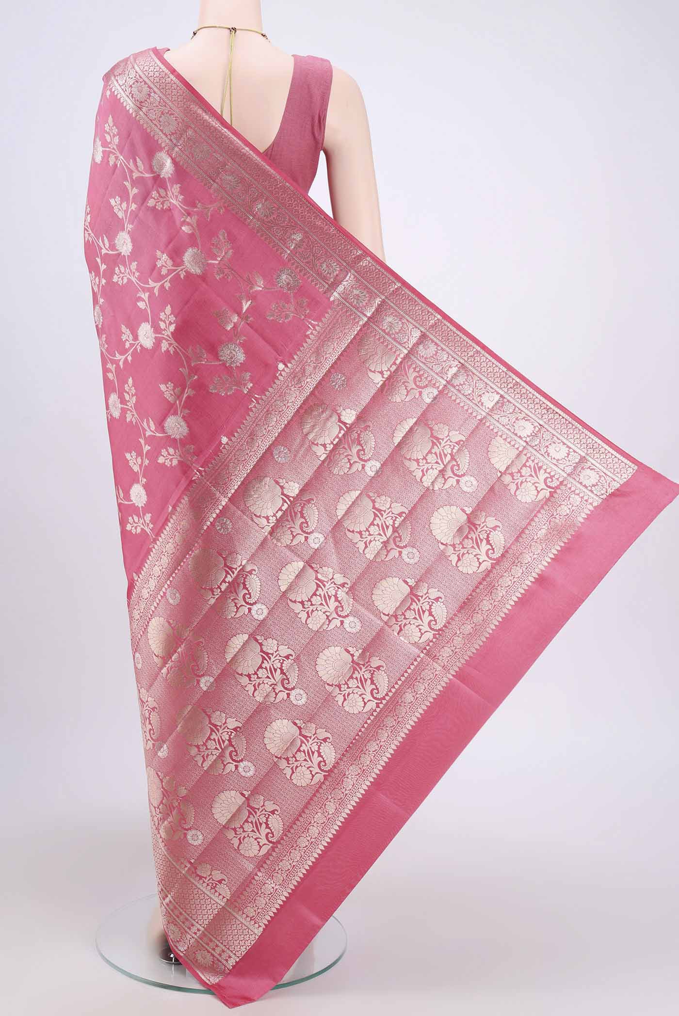 Flat view of Pink Banarasi Raw Silk Saree with Zari Butta on the body and Zari Border. 