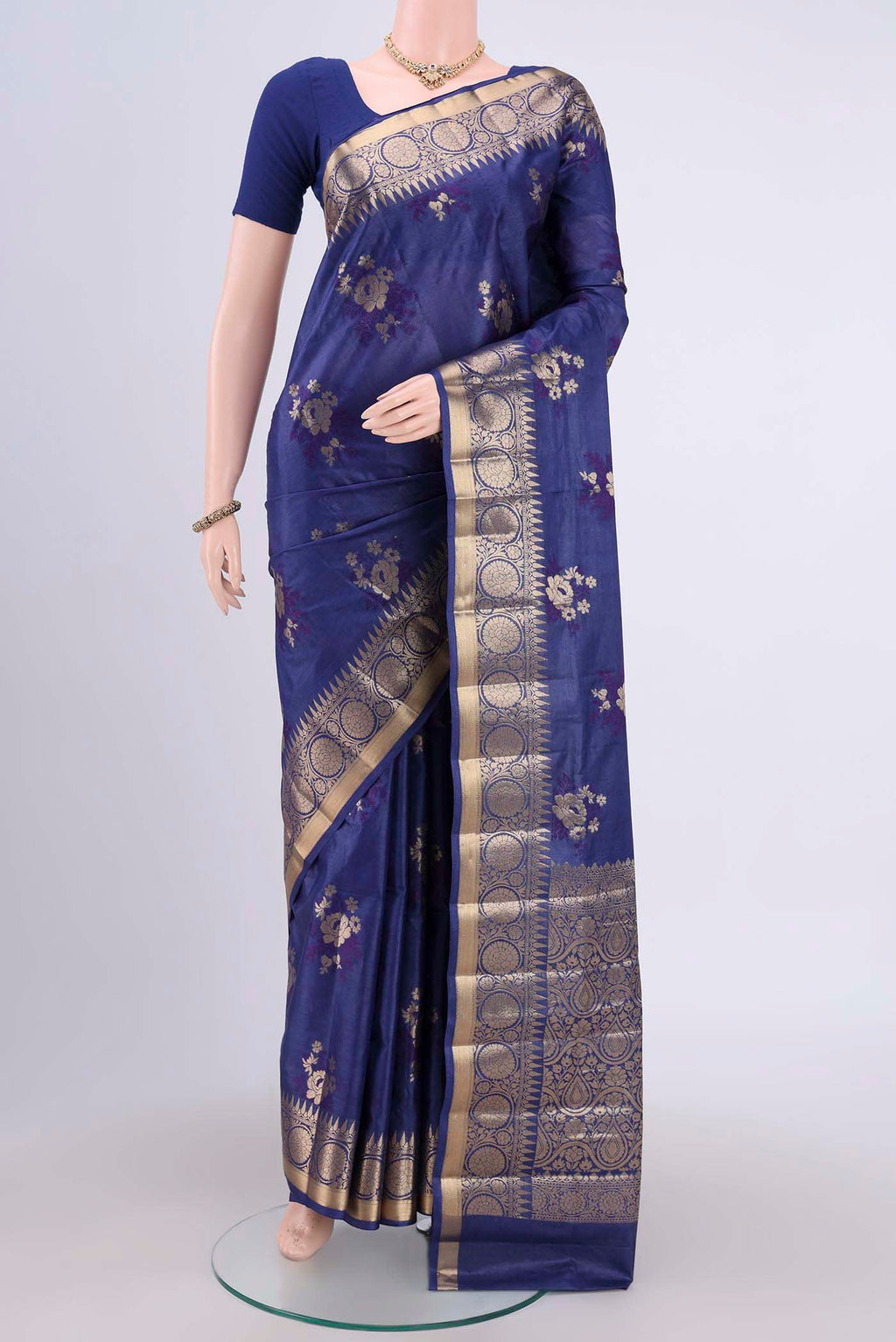Purple Banarasi Tussar Silk Saree with Zari Butta on the body and Zari Border.  displayed on a mannequin