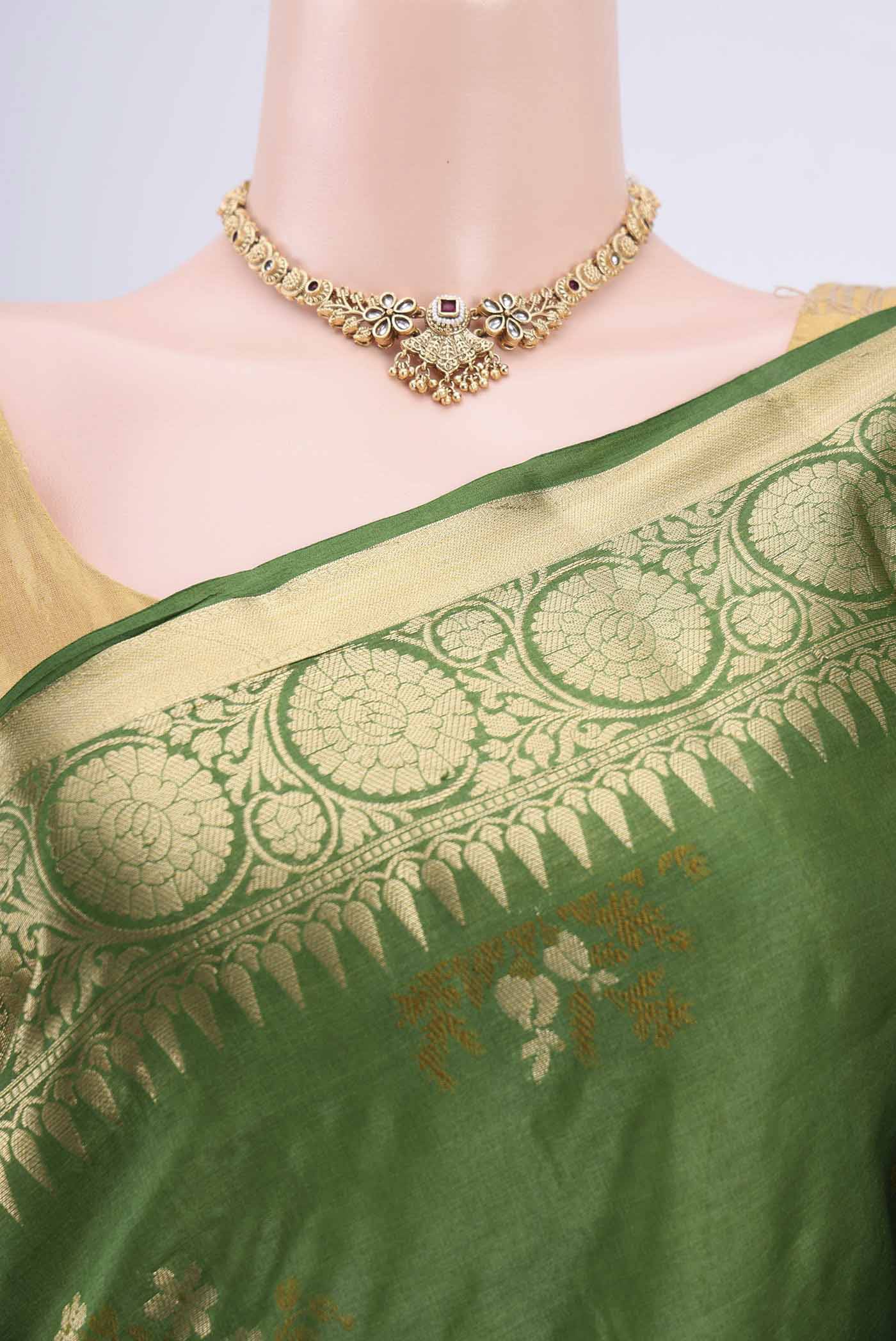 Border image of Green Banarasi Tussar Silk Saree with Zari Butta on the body and Zari Border. 