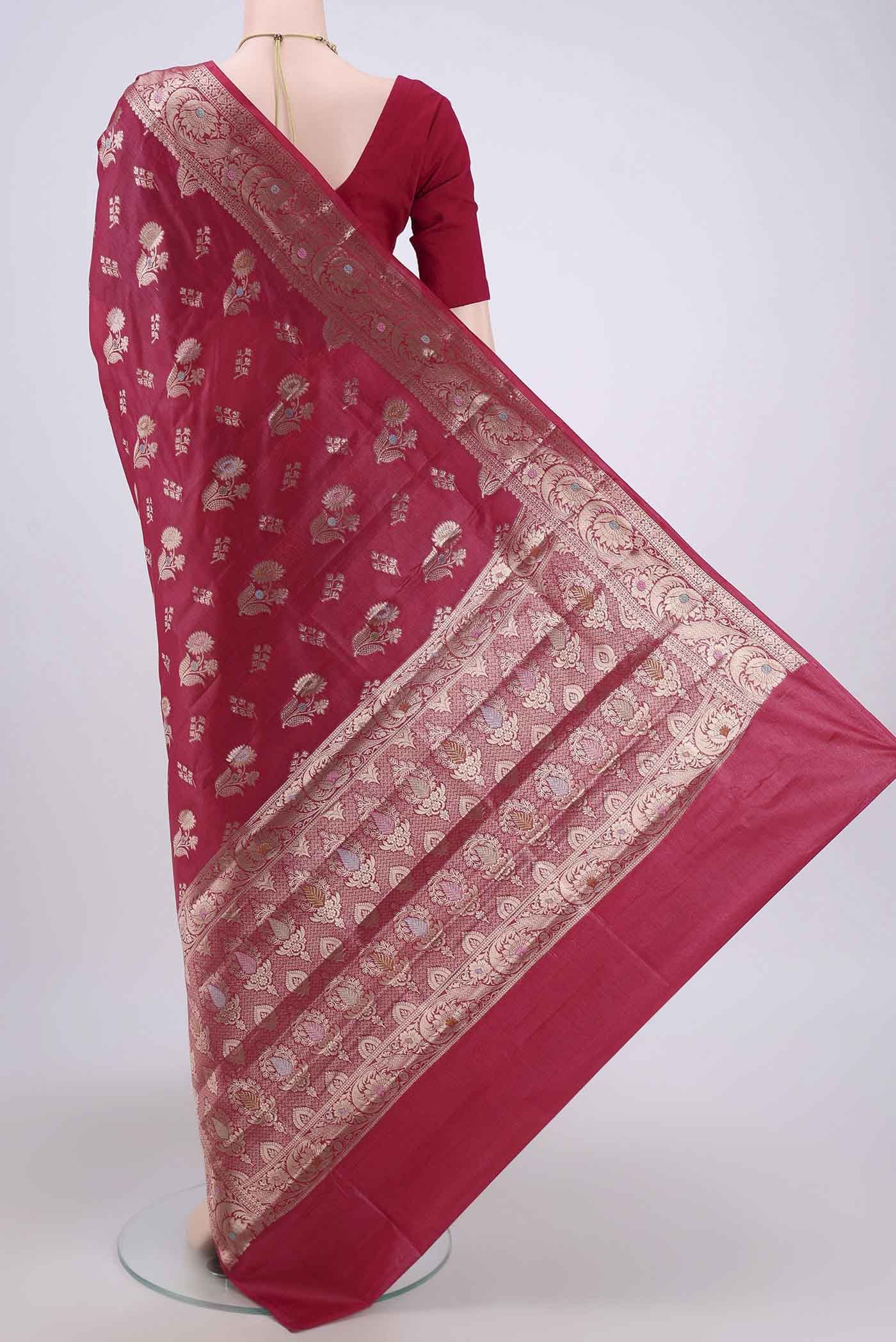 Flat view of Dark Pink Banarasi Tussar Silk Saree with Zari And Thread Butta on the body and Zari And Thread Border. 