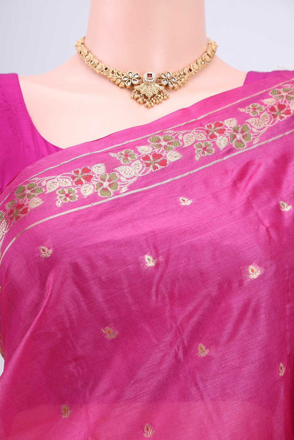 Border image of Rani Pink Banarasi Tussar Silk Saree with Zari Butta on the body and Zari Border. 