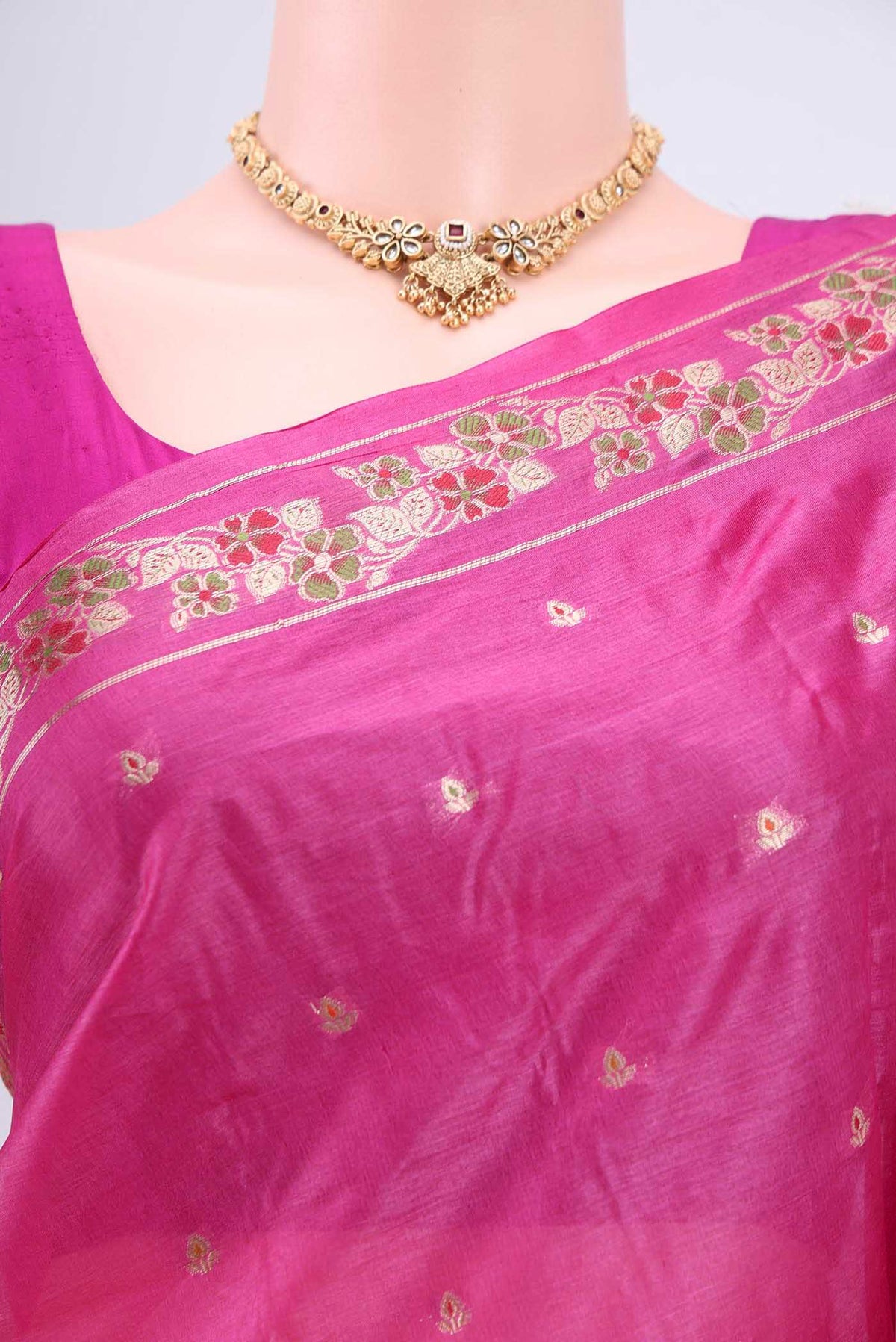 Border image of Rani Pink Banarasi Tussar Silk Saree with Zari Butta on the body and Zari Border. 