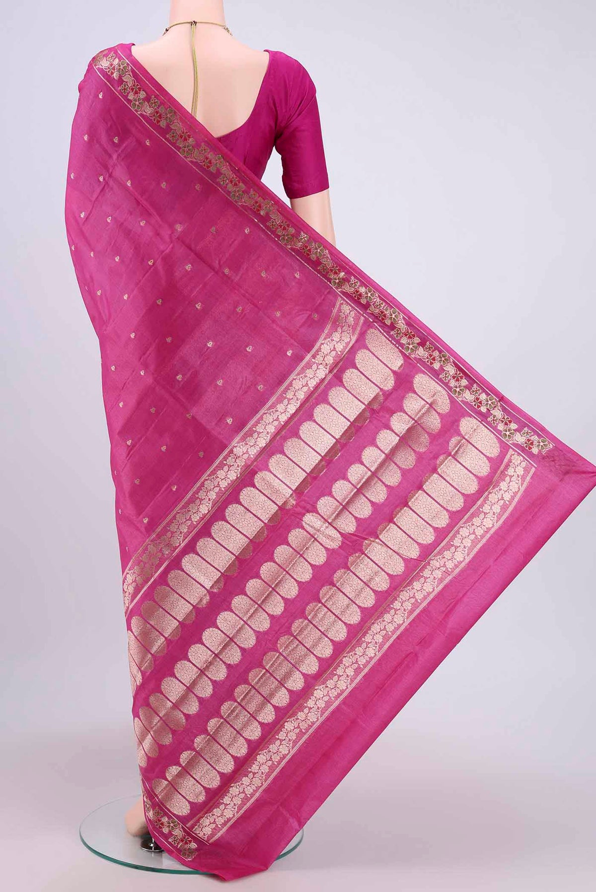 Flat view of Rani Pink Banarasi Tussar Silk Saree with Zari Butta on the body and Zari Border. 