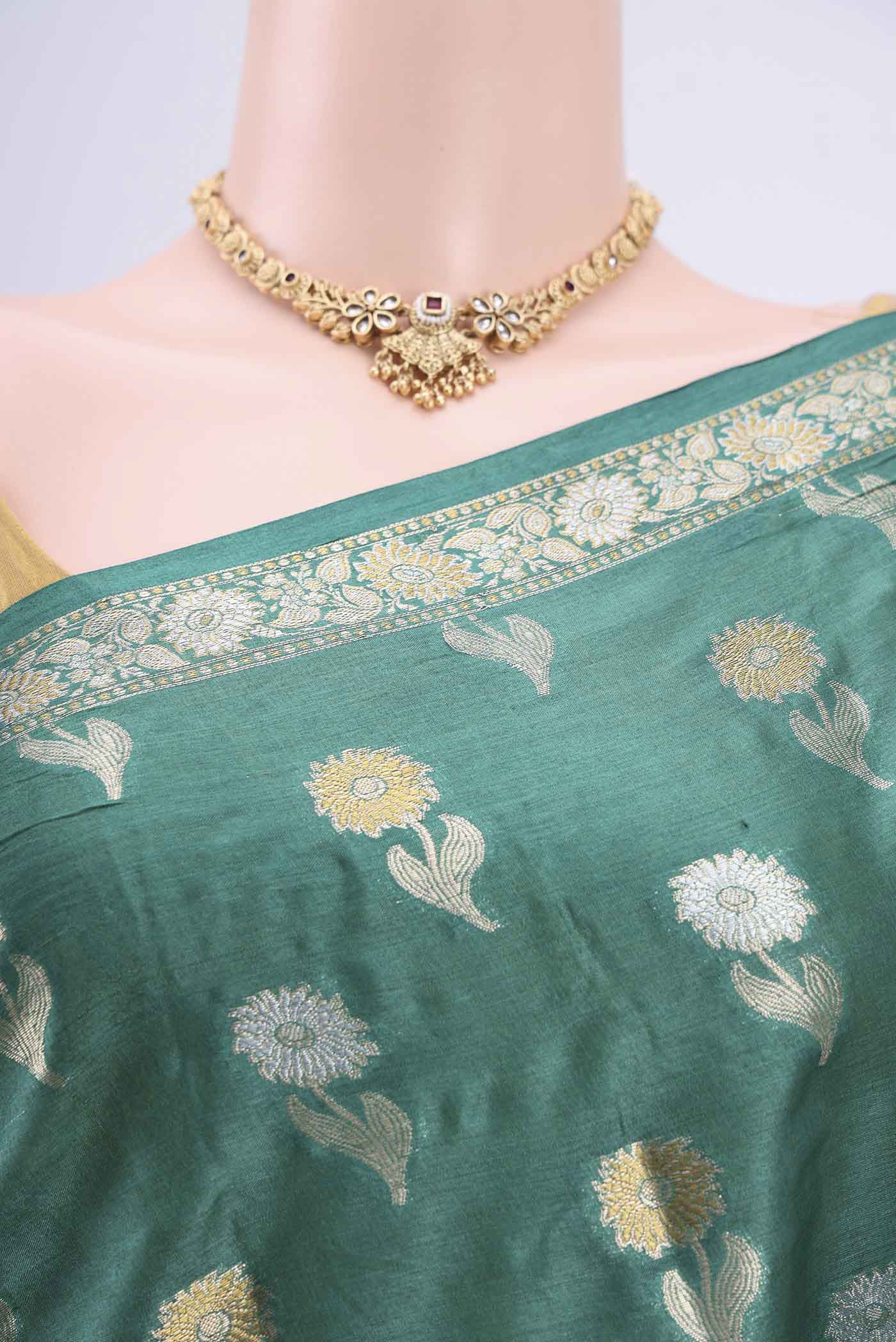 Border image of Sea Green Banarasi Tussar Silk Saree with Zari Butta on the body and Zari Border. 