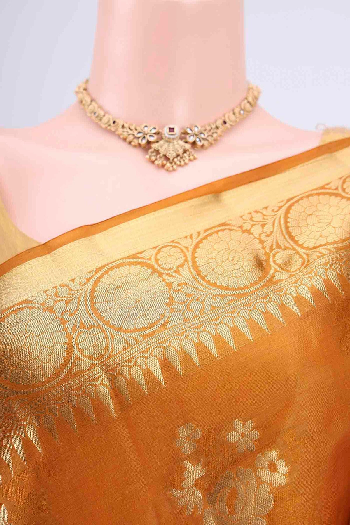 Border image of Mustard Banarasi Tussar Silk Saree with Zari Butta on the body and Zari Border. 