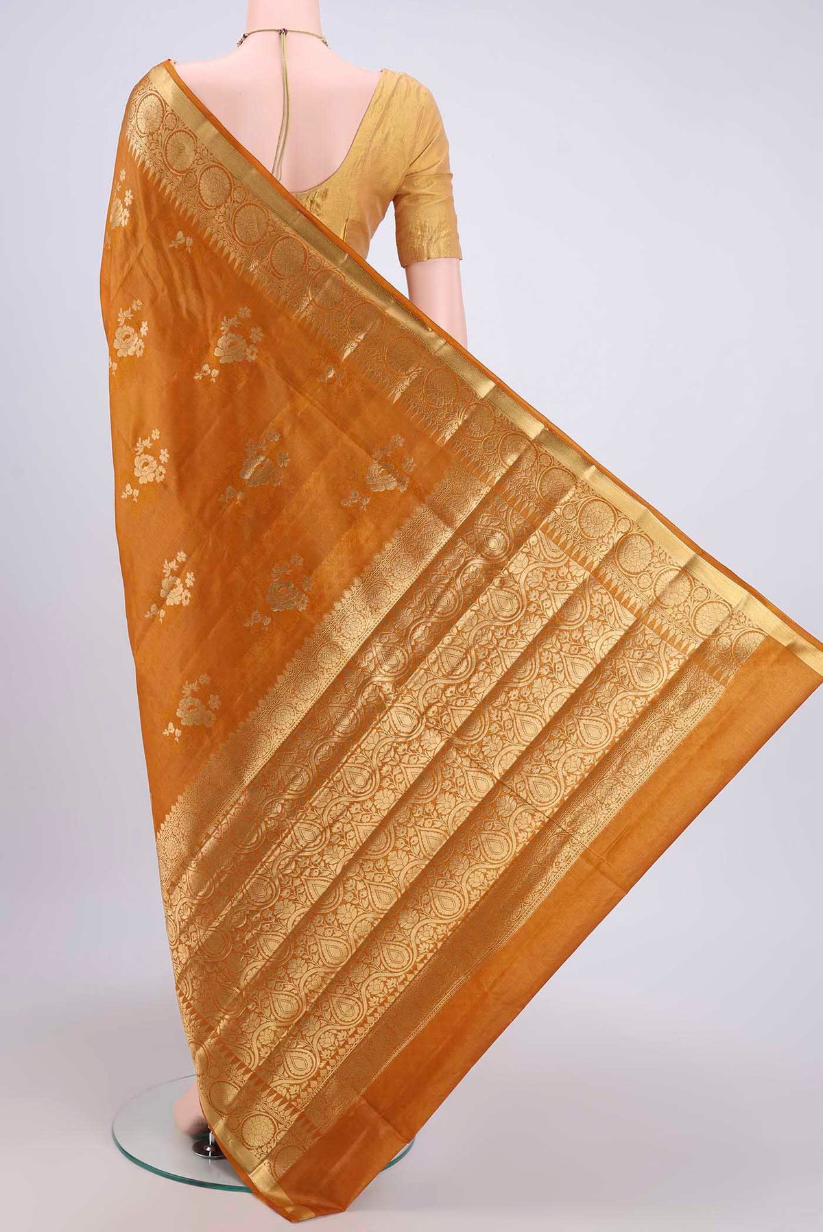Flat view of Mustard Banarasi Tussar Silk Saree with Zari Butta on the body and Zari Border. 