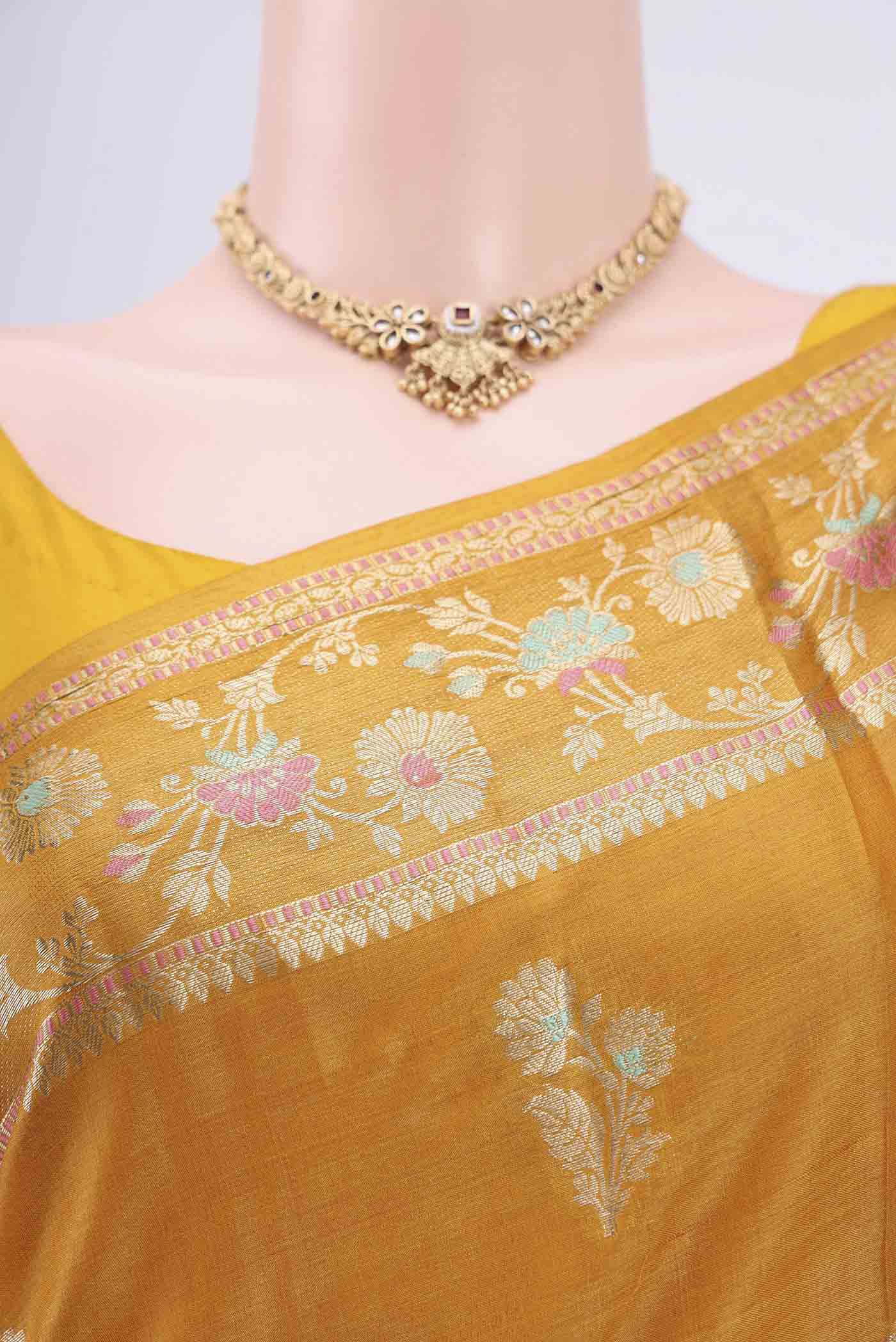 Border image of Mustard Banarasi Tussar Silk Saree with Zari Butta on the body and Zari Border. 